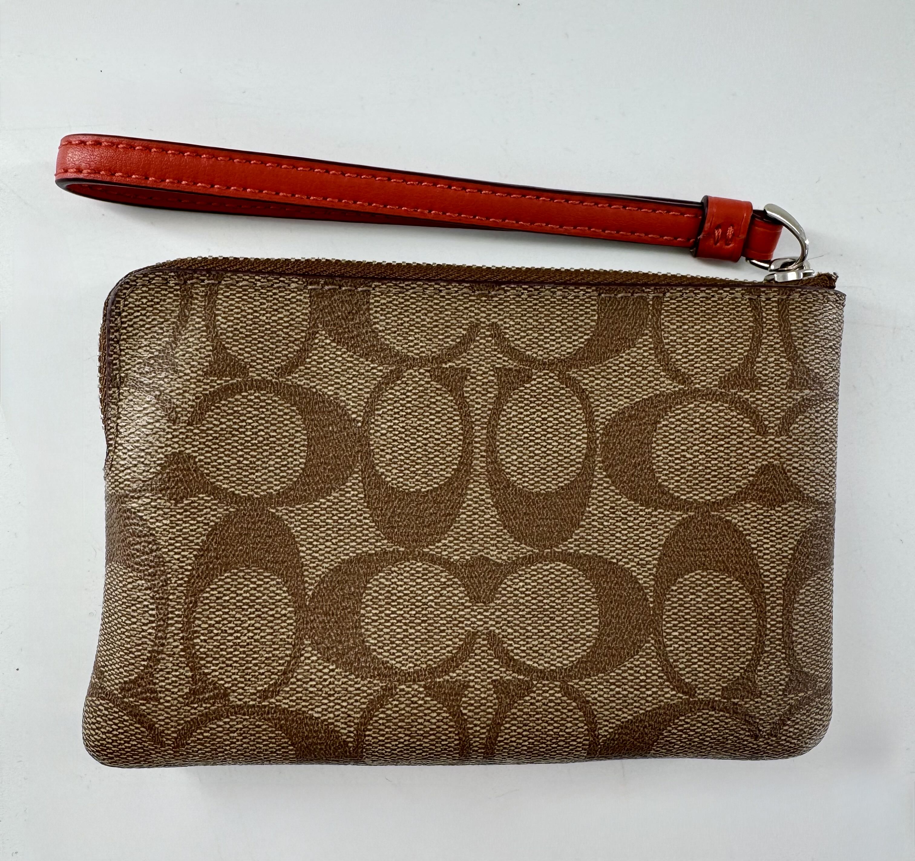 R75 signature stripe wristlet