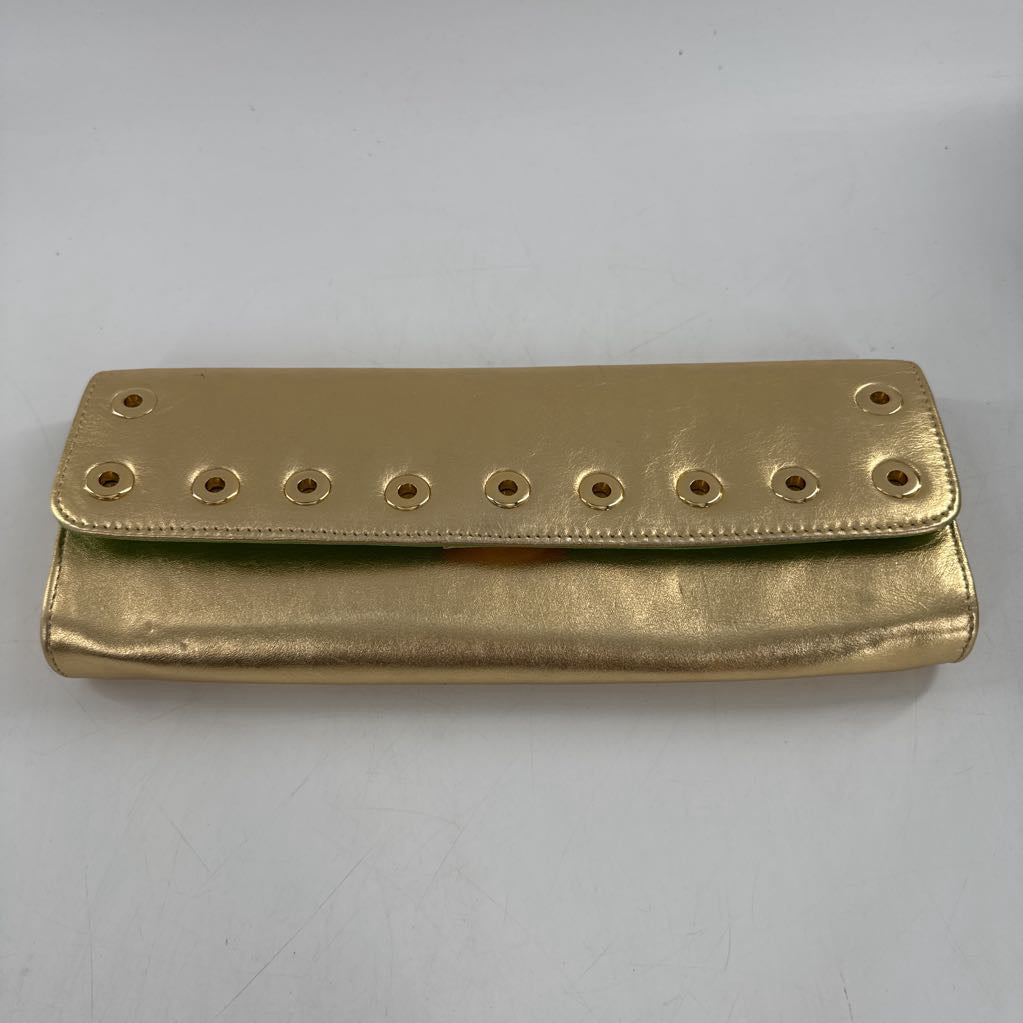 gold leather grommet clutch
