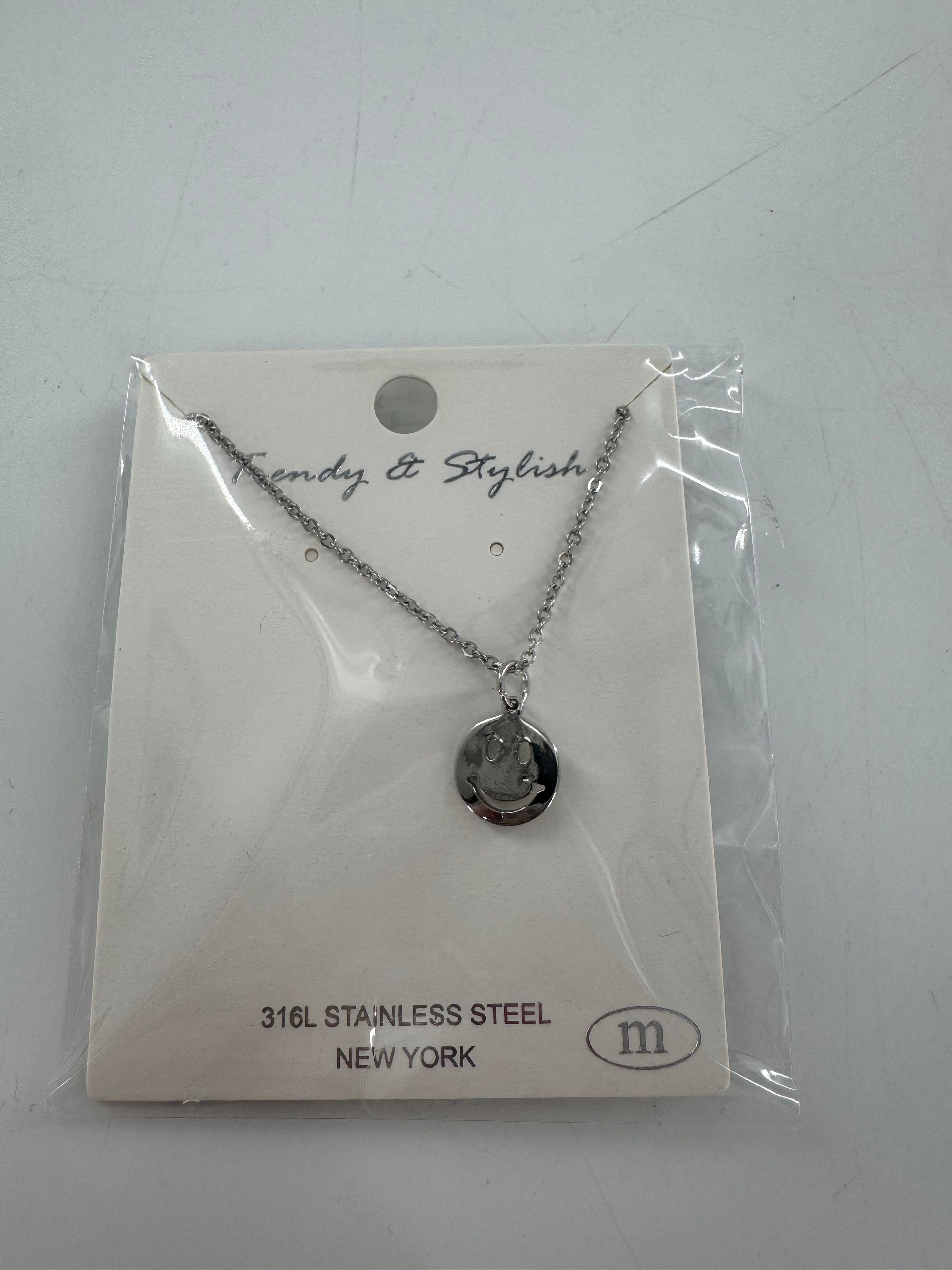 silver smiley face necklace