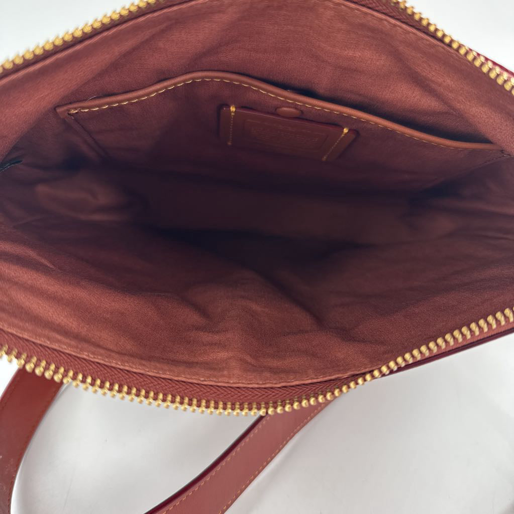 signature turnlock top zip crossbody