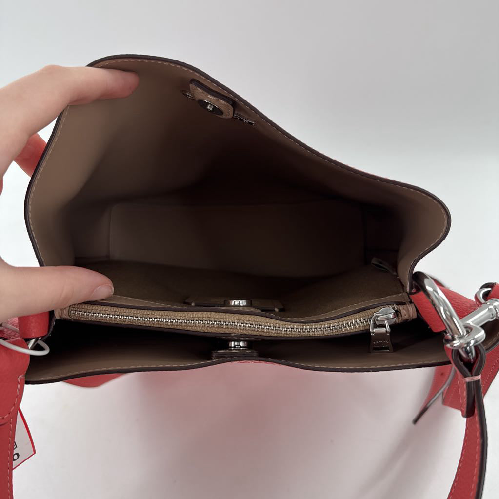 pebbled snap closure bucket bag