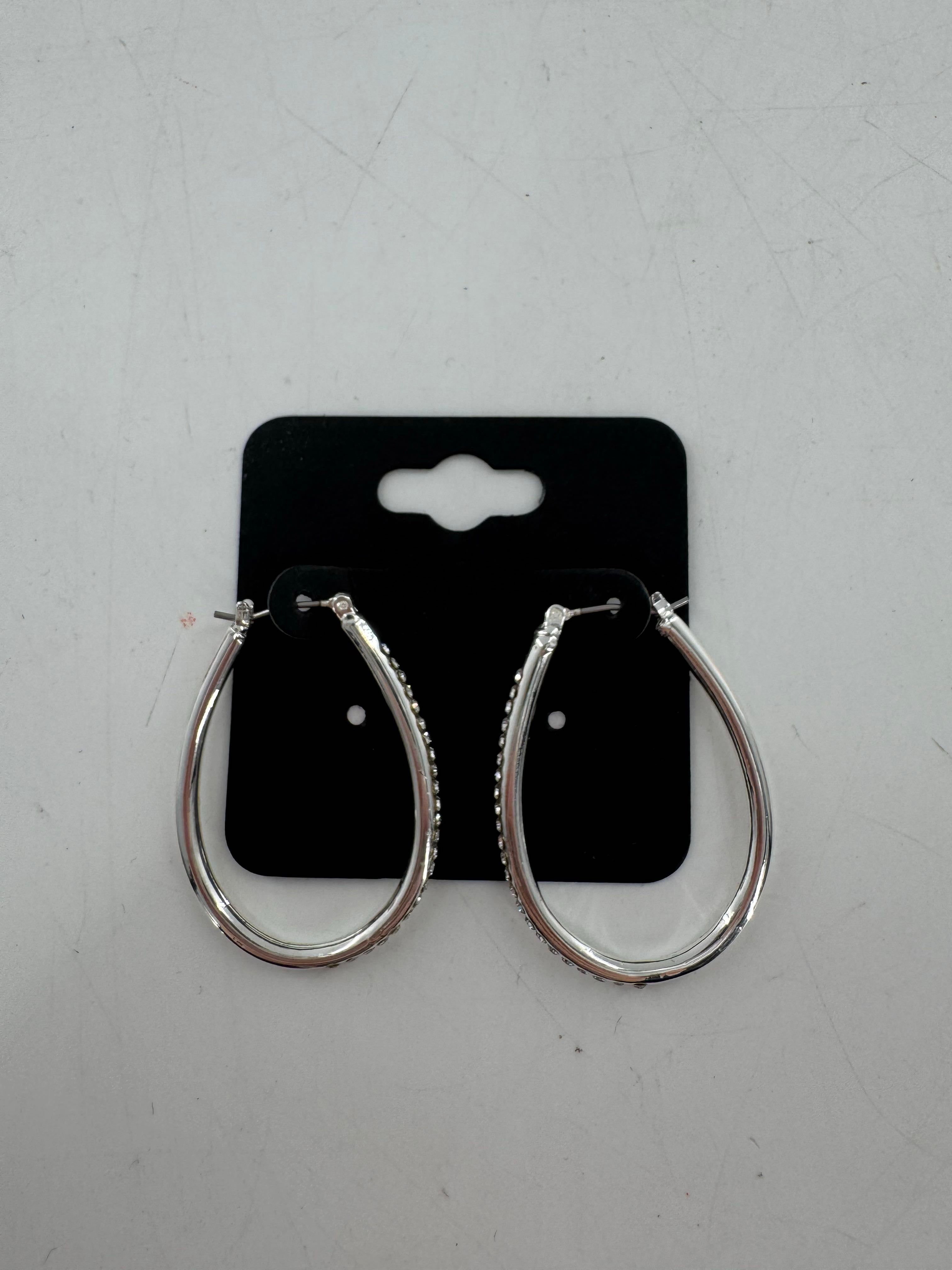 goldtone CZ oval hoop earrings