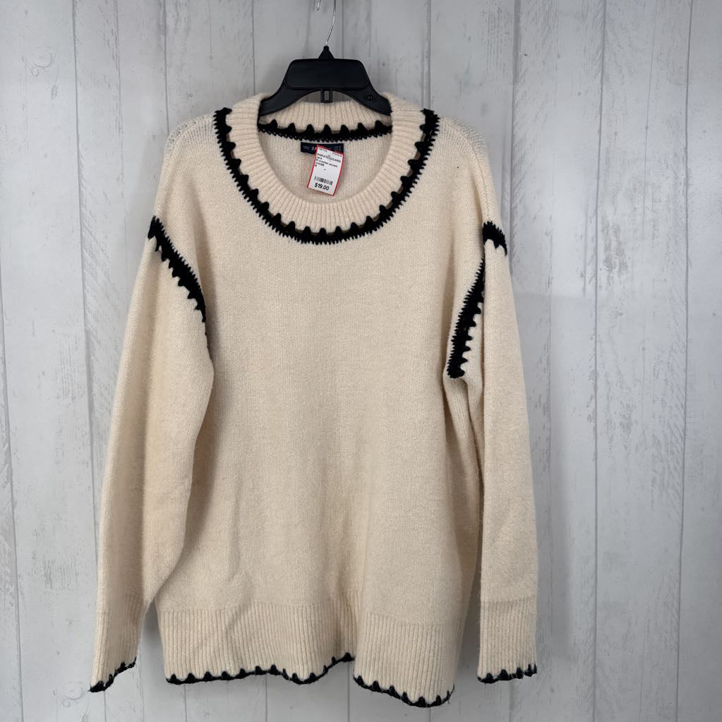 M crochet accent sweater