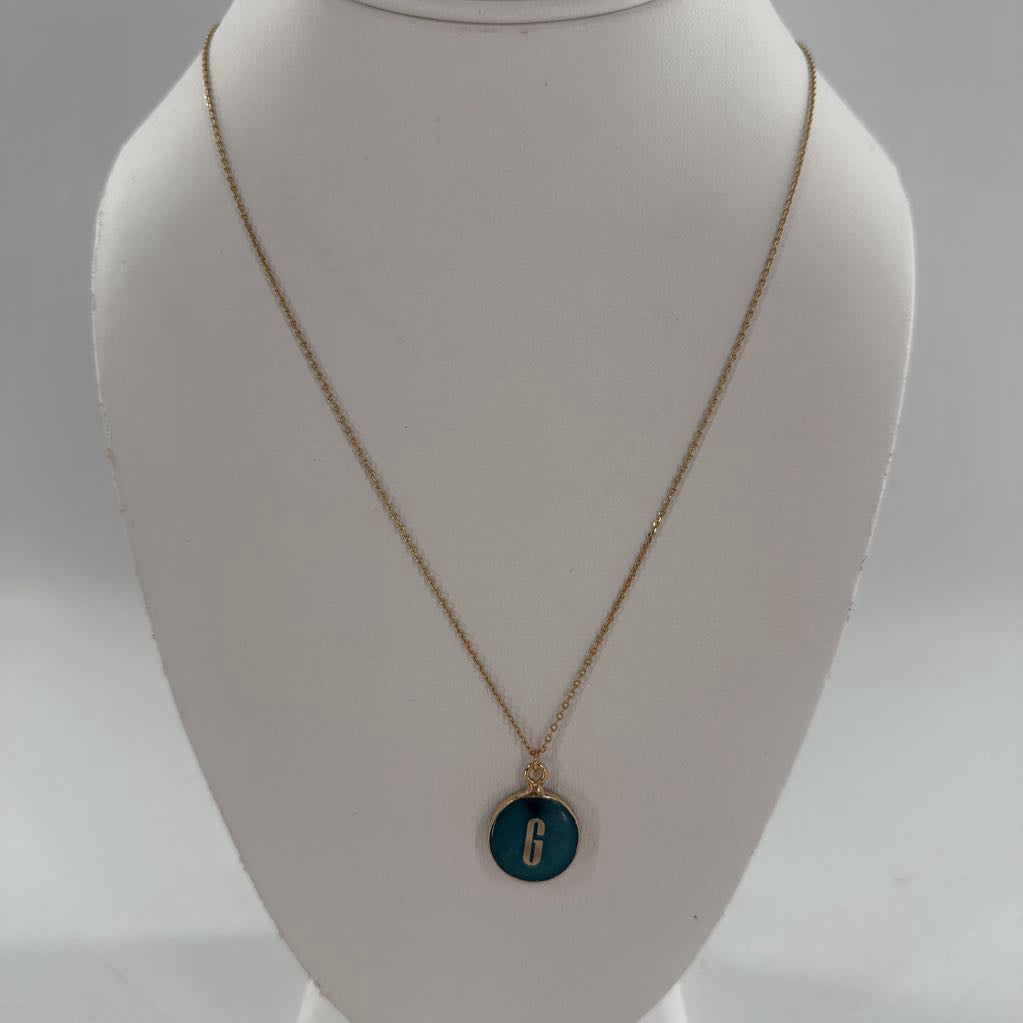 10" gold tone necklace w/ green ( G ) charm