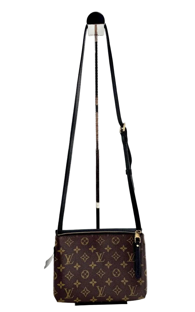 Louis Vuitton Monogram Twice crossbody w/ leather flap closure