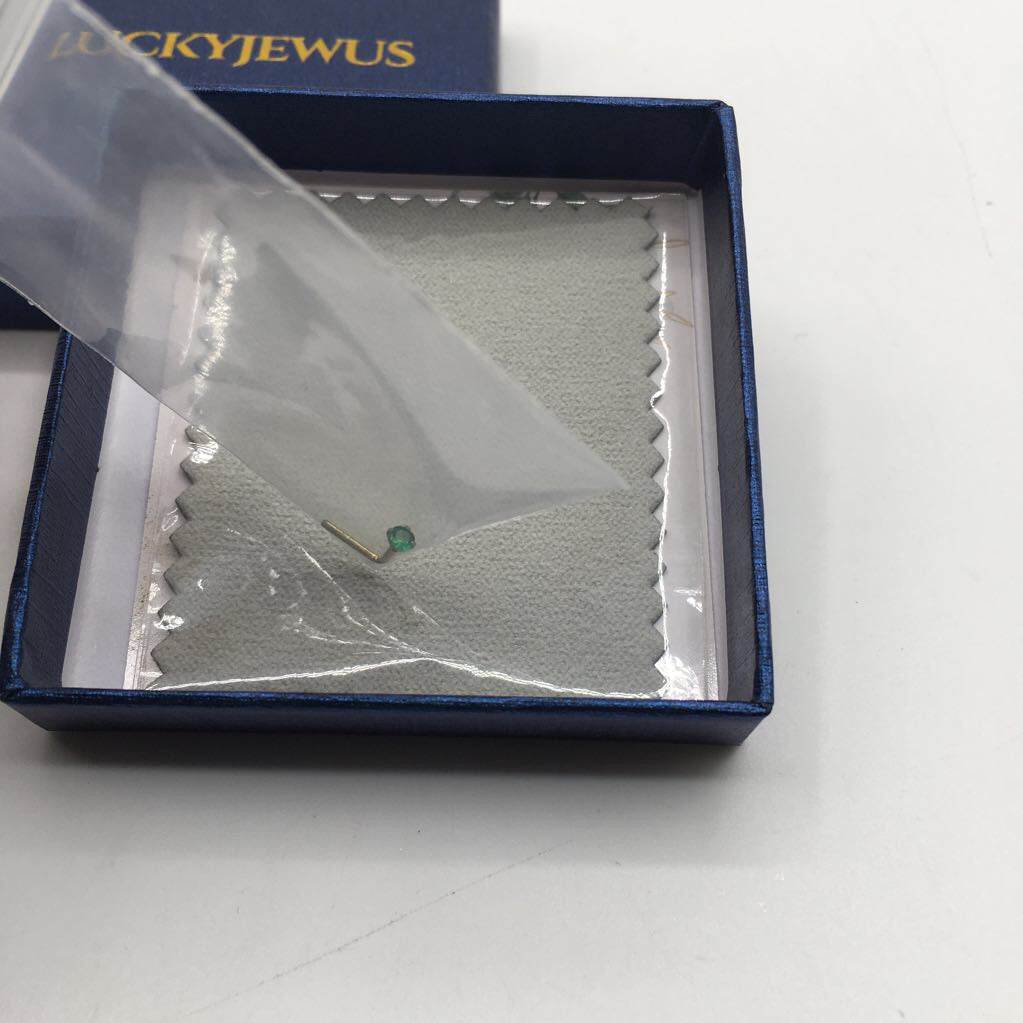 green stud nose ring