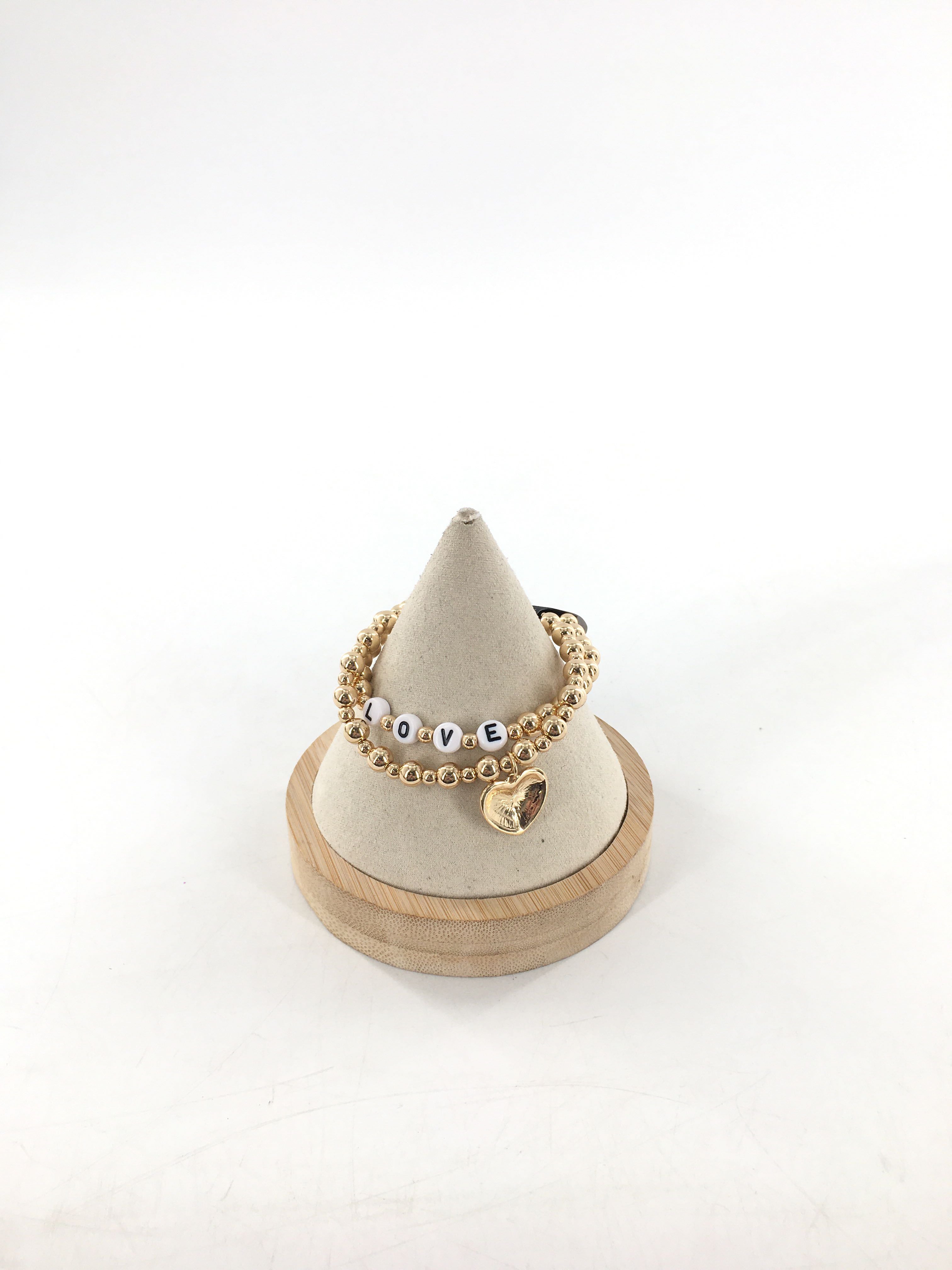 gold tone beaded bracelet stack (love)