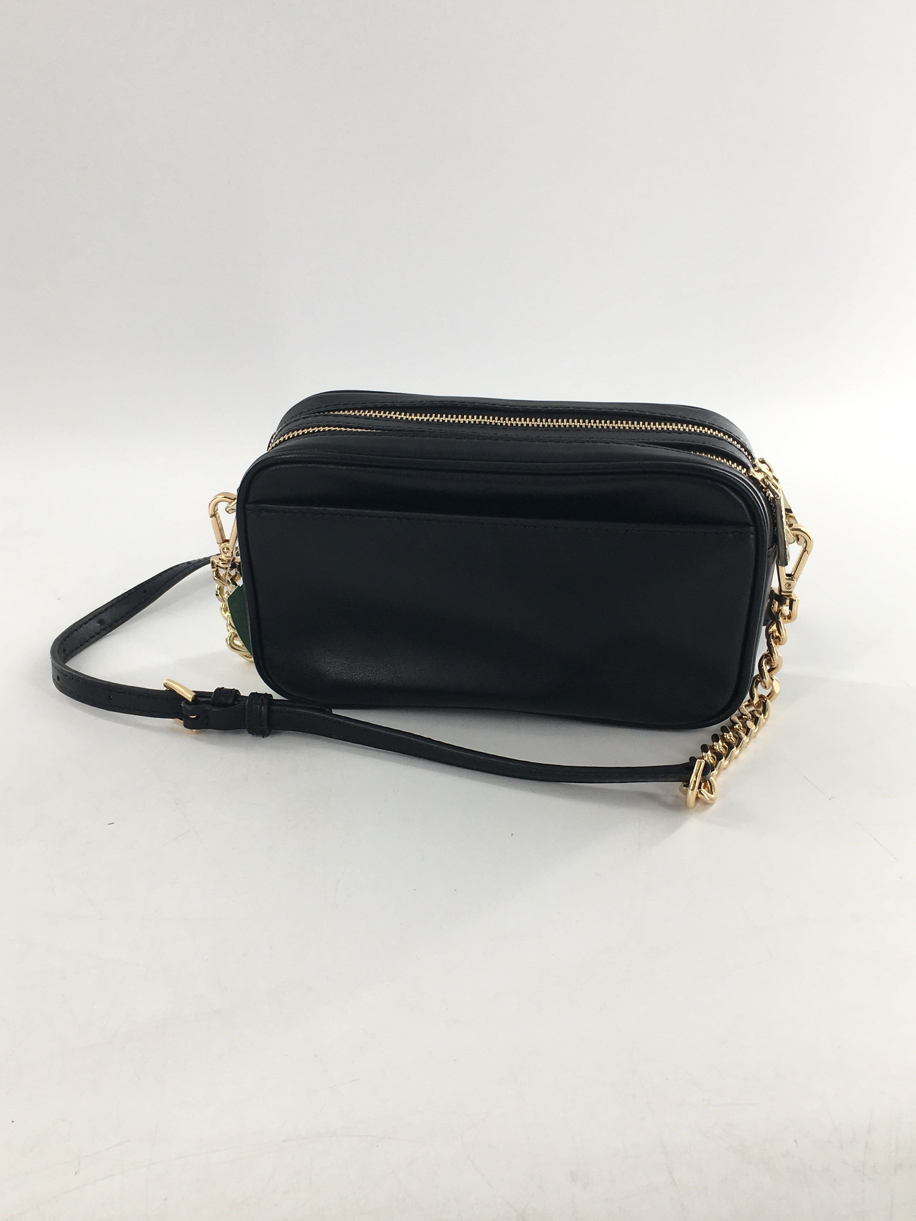 sm studded butterfly camo crossbody