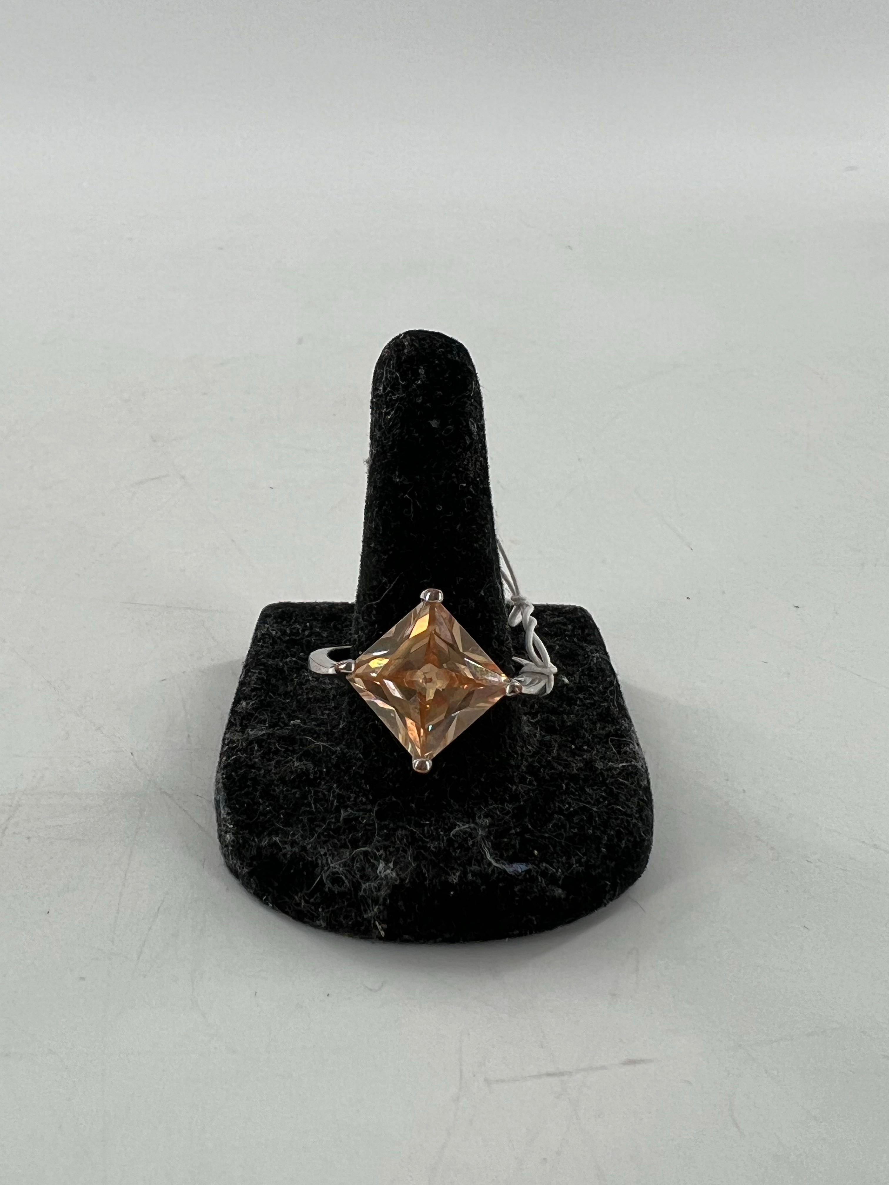sz6 peach colored cz ring