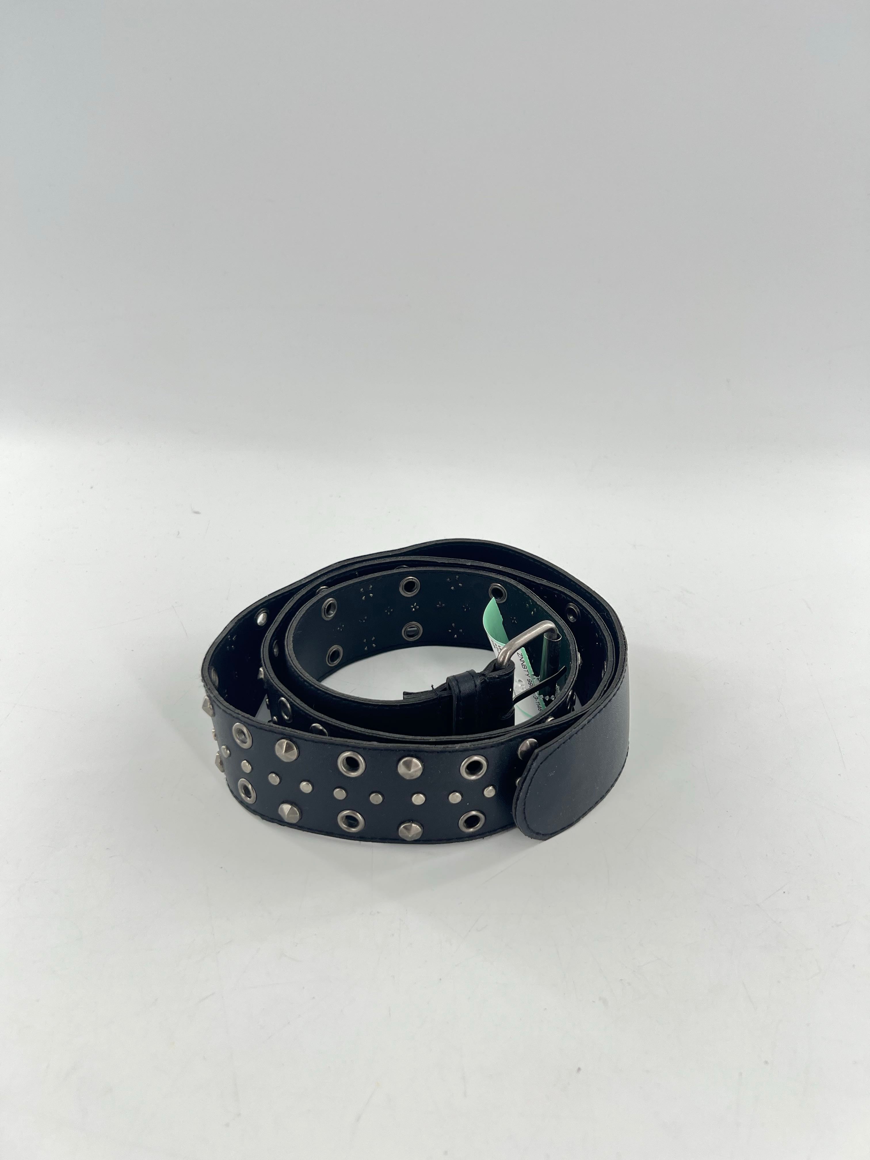 studded grommet belt