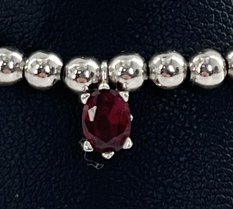 silver beaded stretch bracelet/red stone