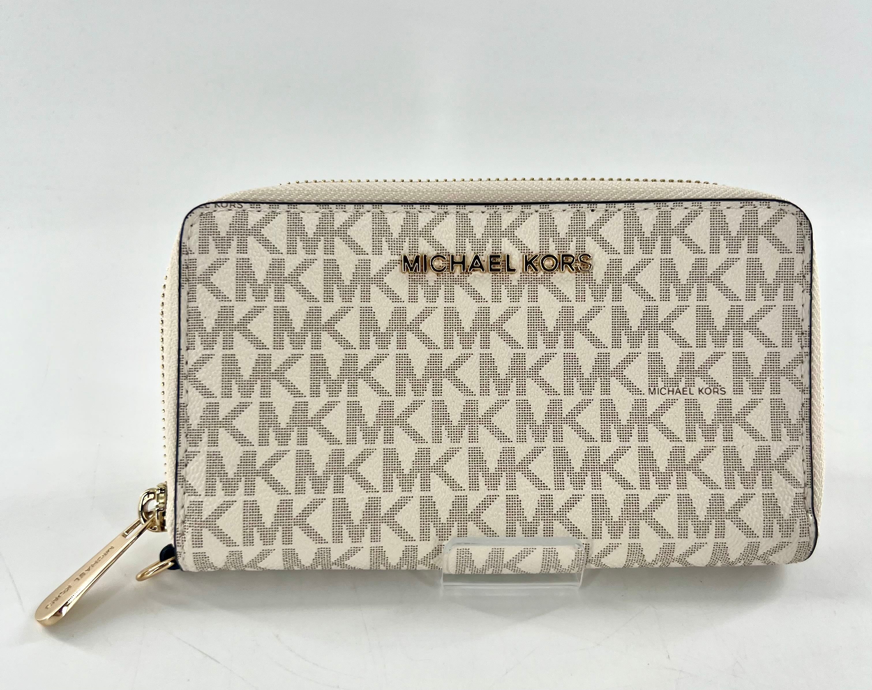 monogram zip around wallet