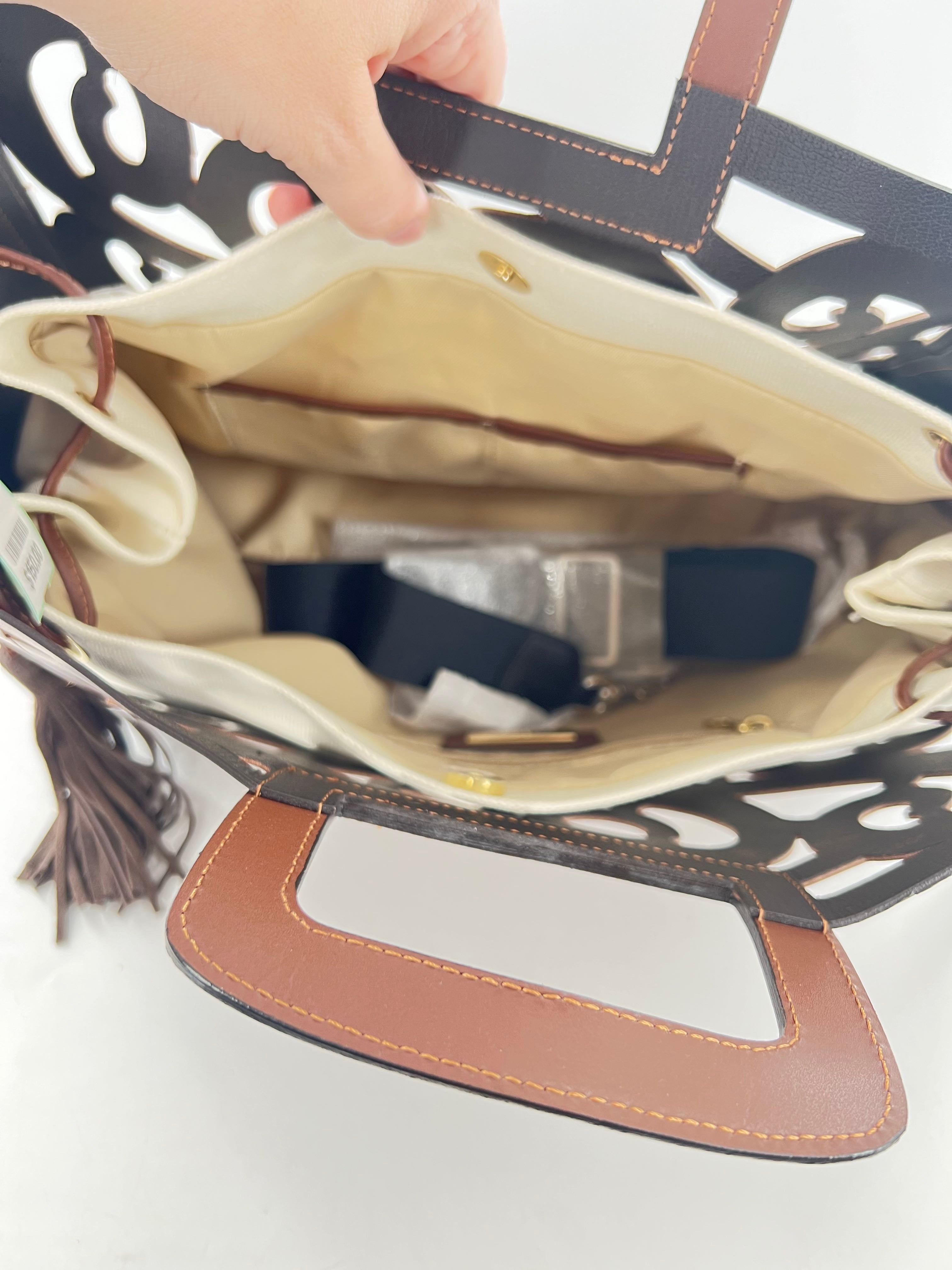 R415 leather hand-tooled musical notes tote