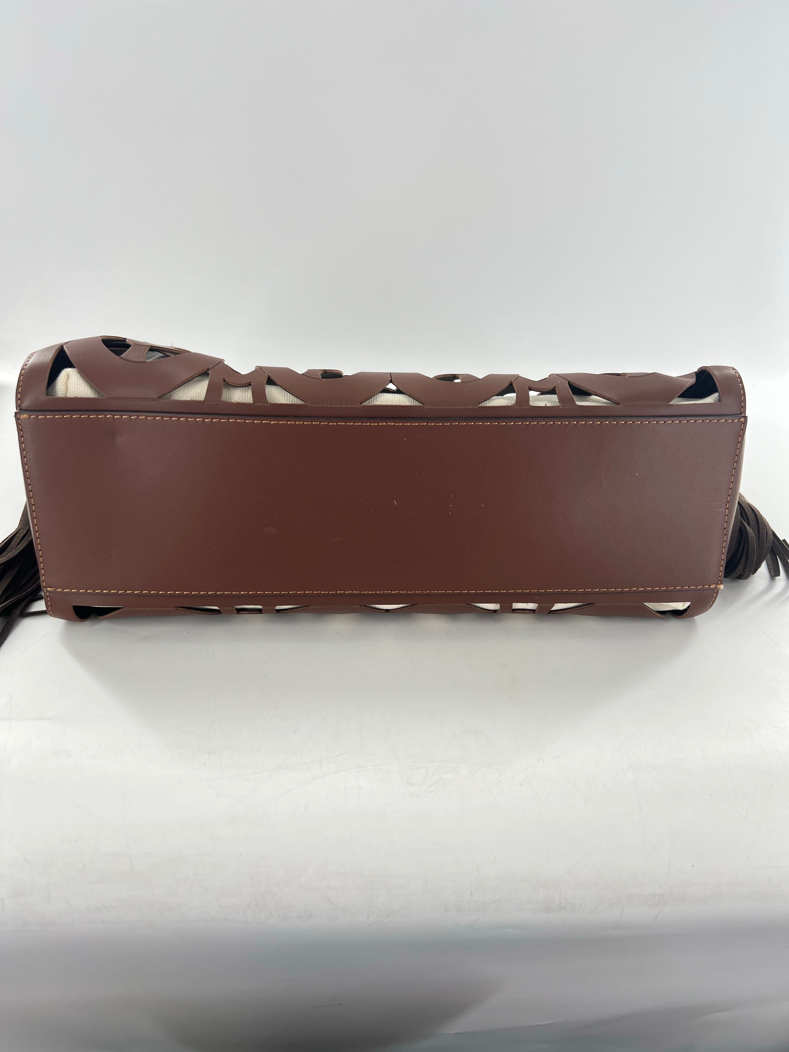 R415 leather hand-tooled musical notes tote