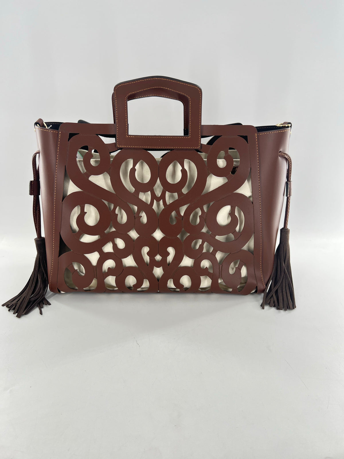 R415 leather hand-tooled musical notes tote