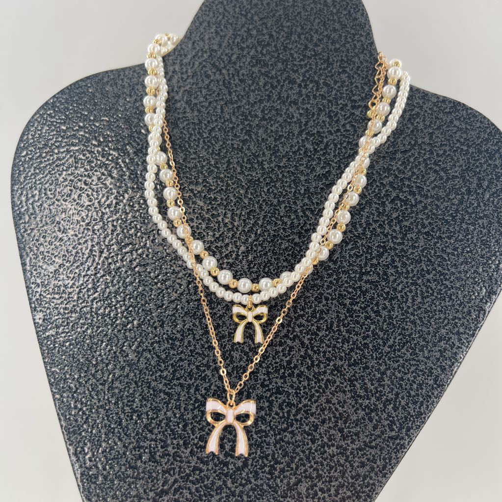 gold & white bows necklace stack