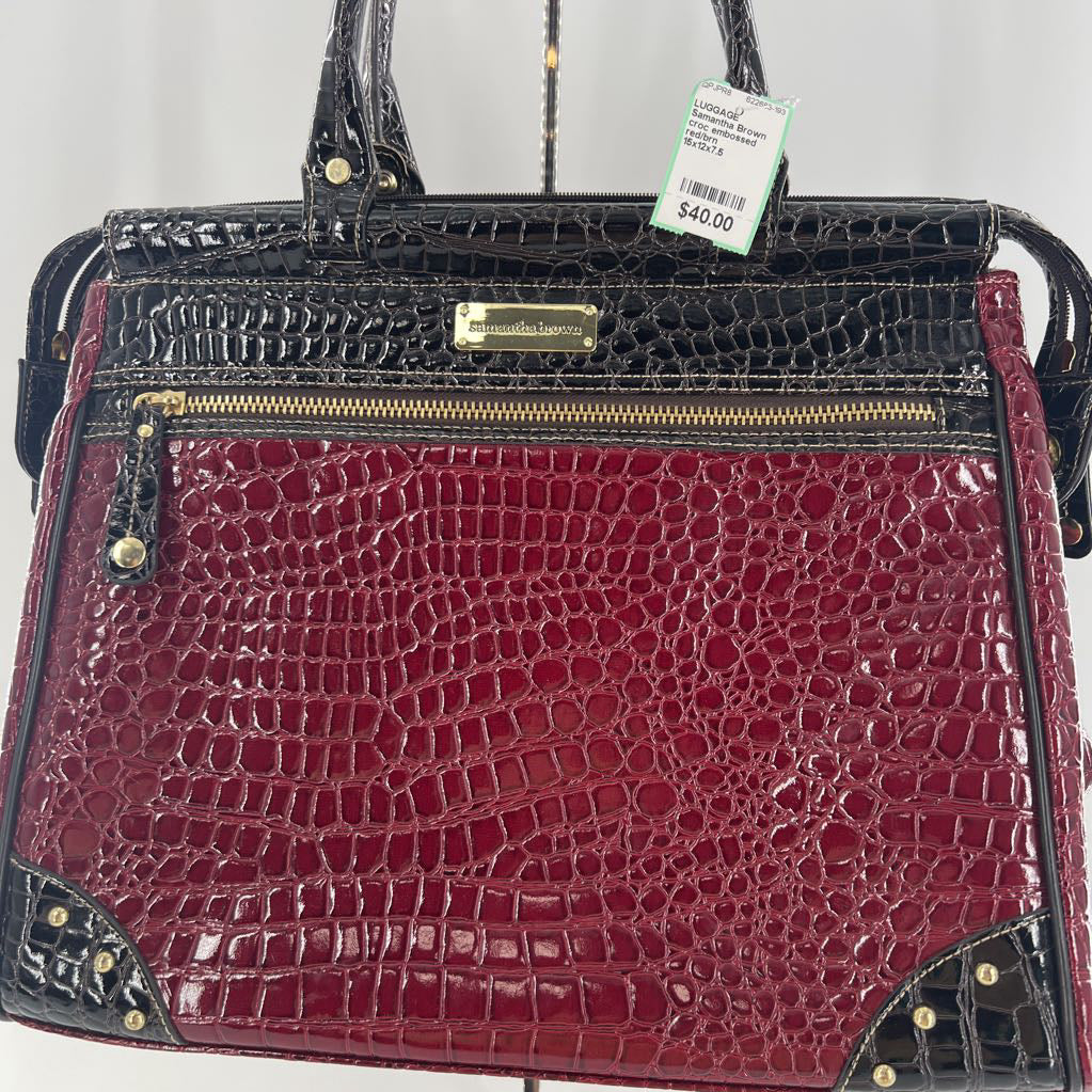 croc embossed travel bag