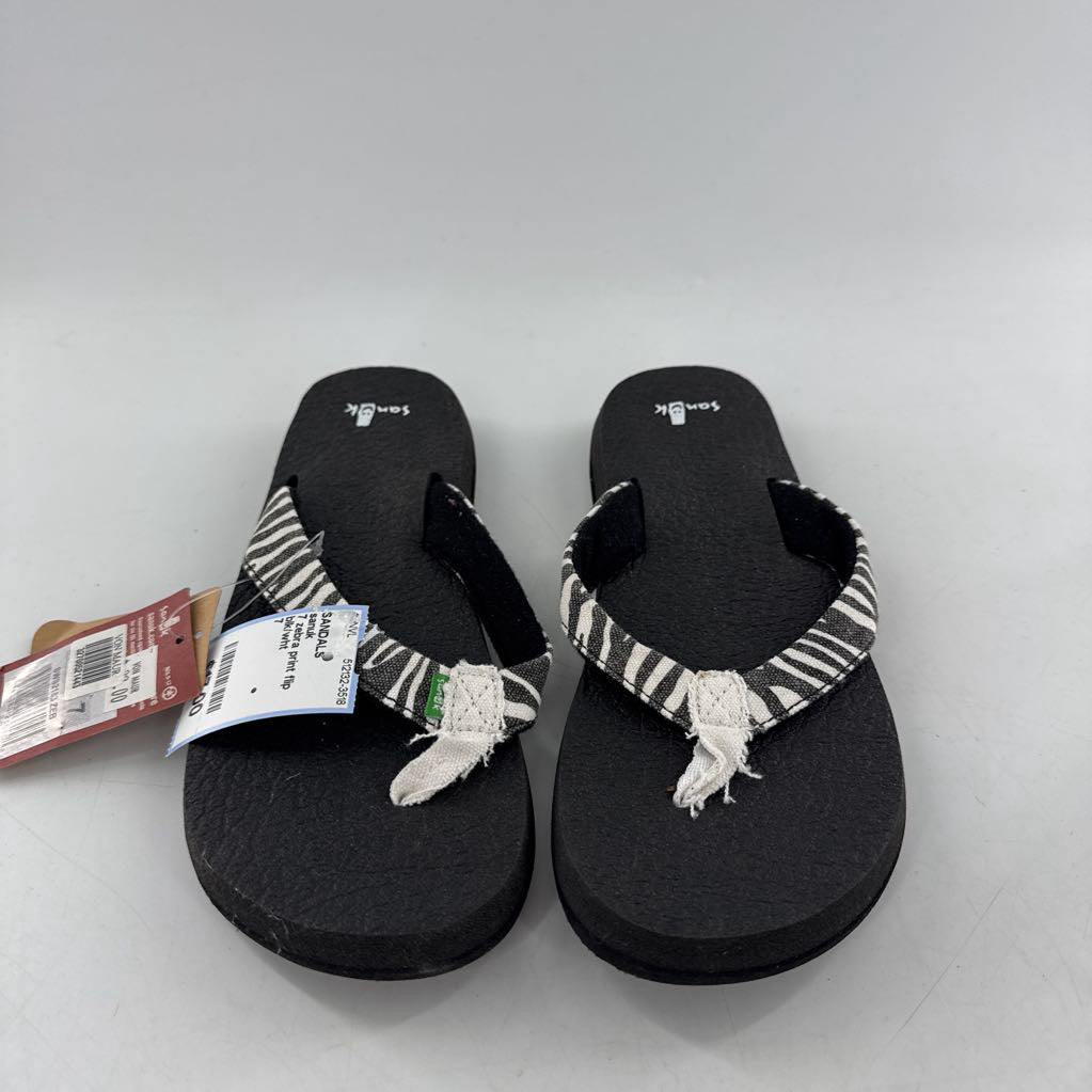 7 zebra print flip flops