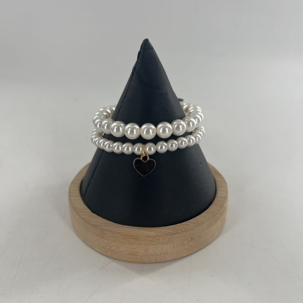 white stretch bracelet stack w/ blk heart charm