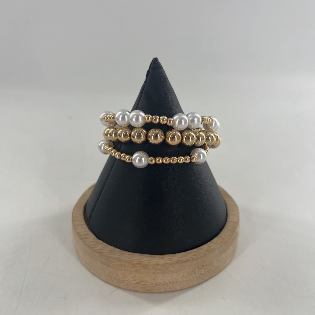 white & gold stretch bracelet stack