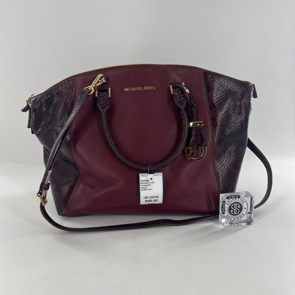 snakeskin embossed side panels and handles satchel