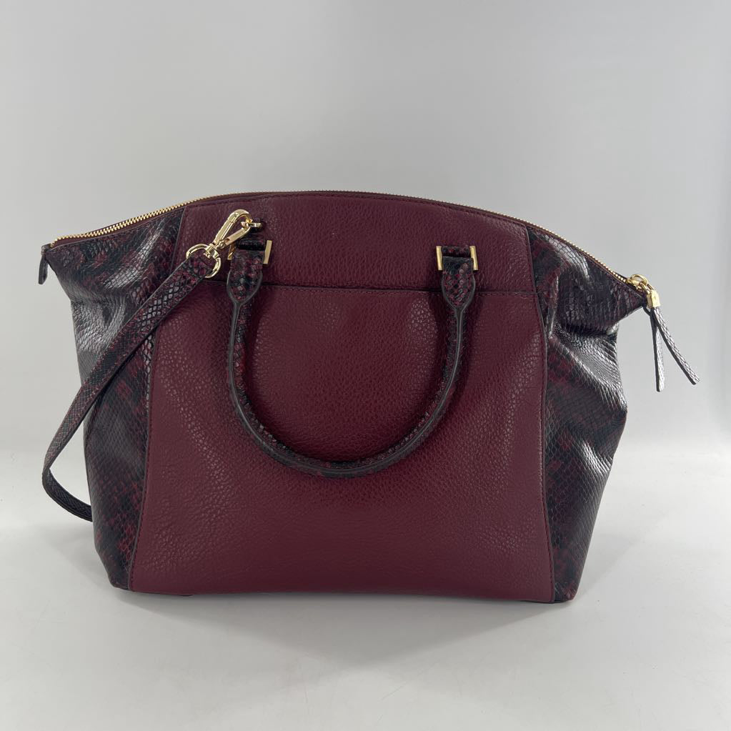 snakeskin embossed side panels and handles satchel