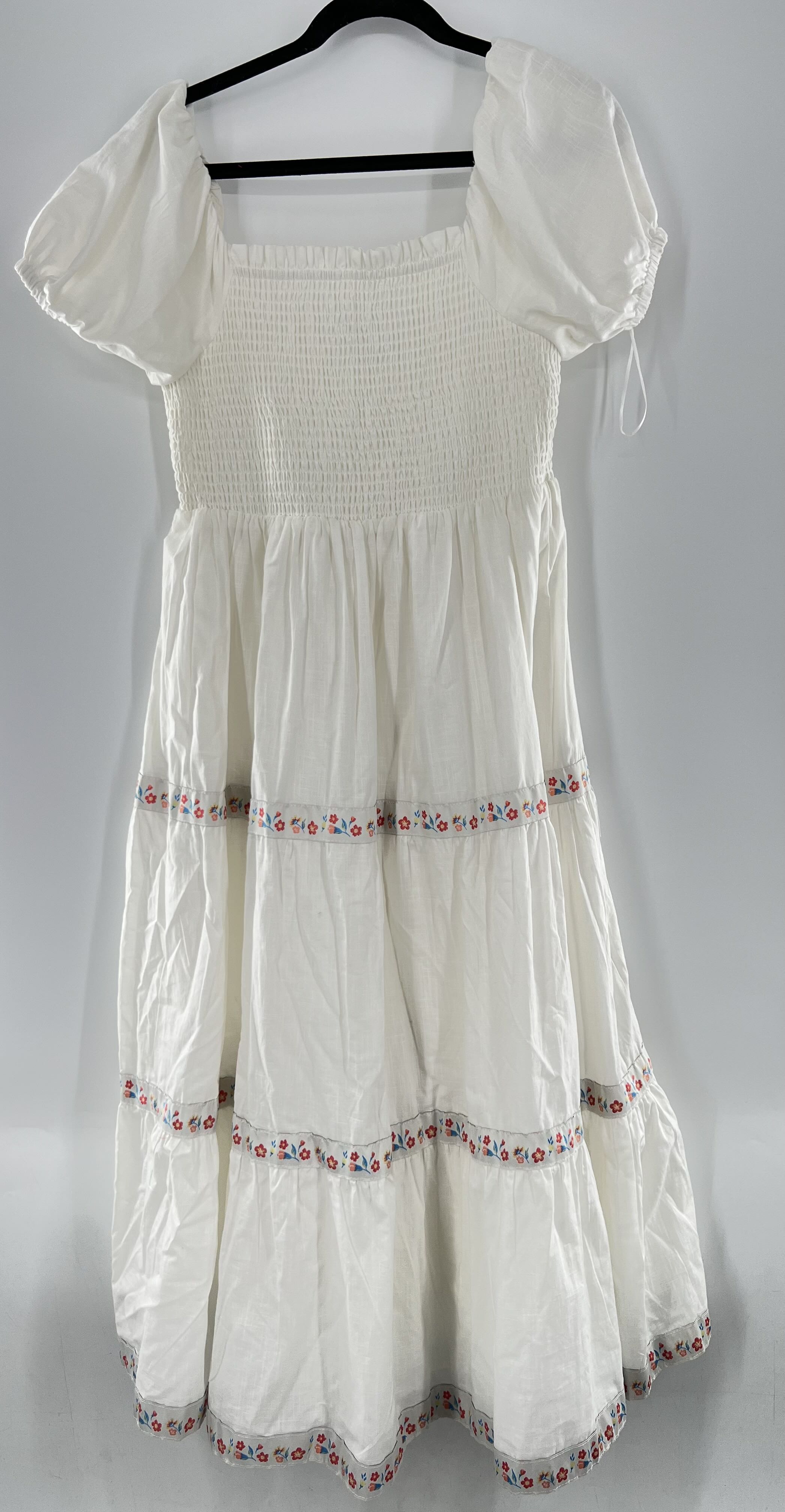 6 smocjed tiered flo detail s/s dress