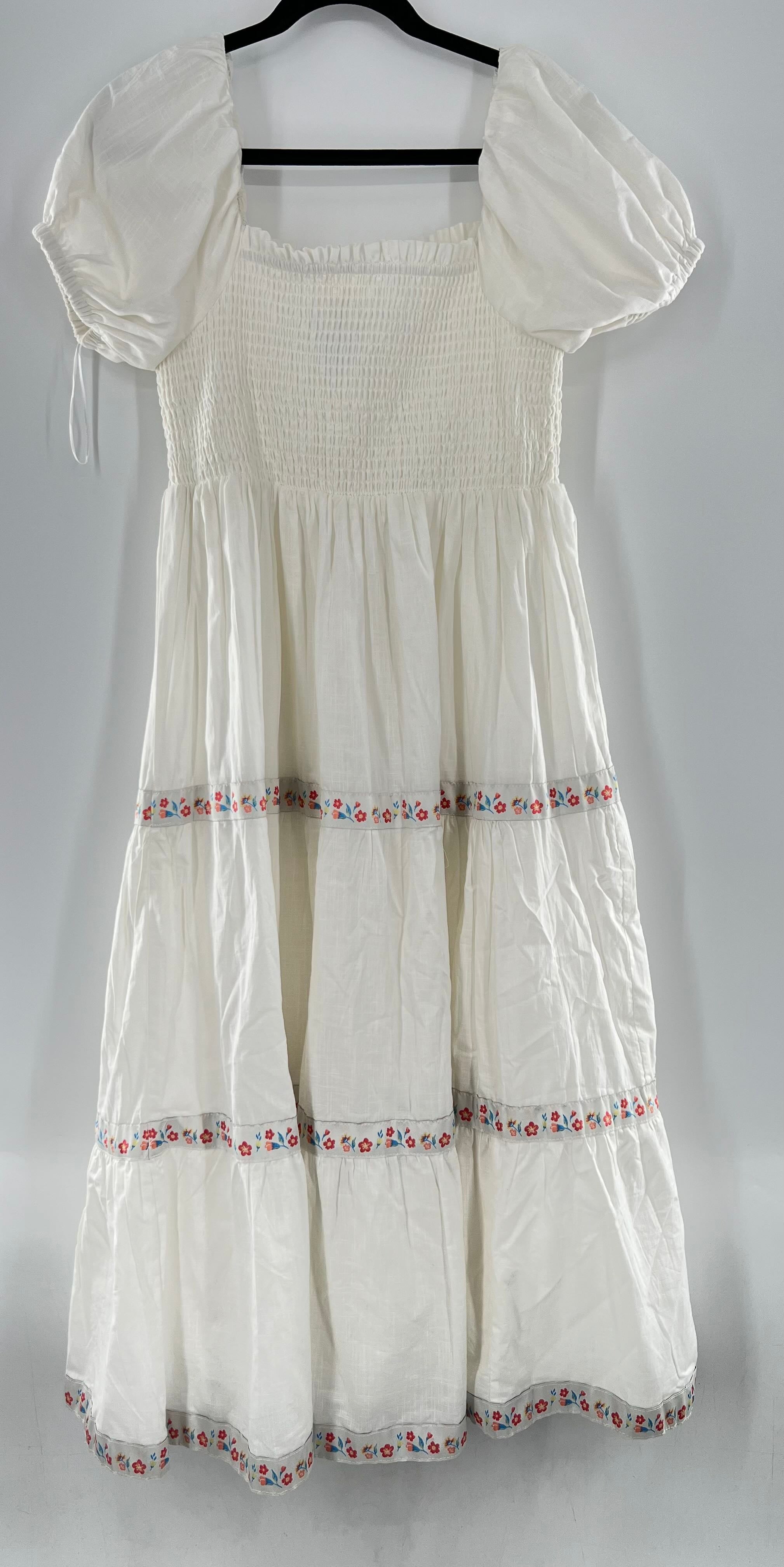 6 smocjed tiered flo detail s/s dress
