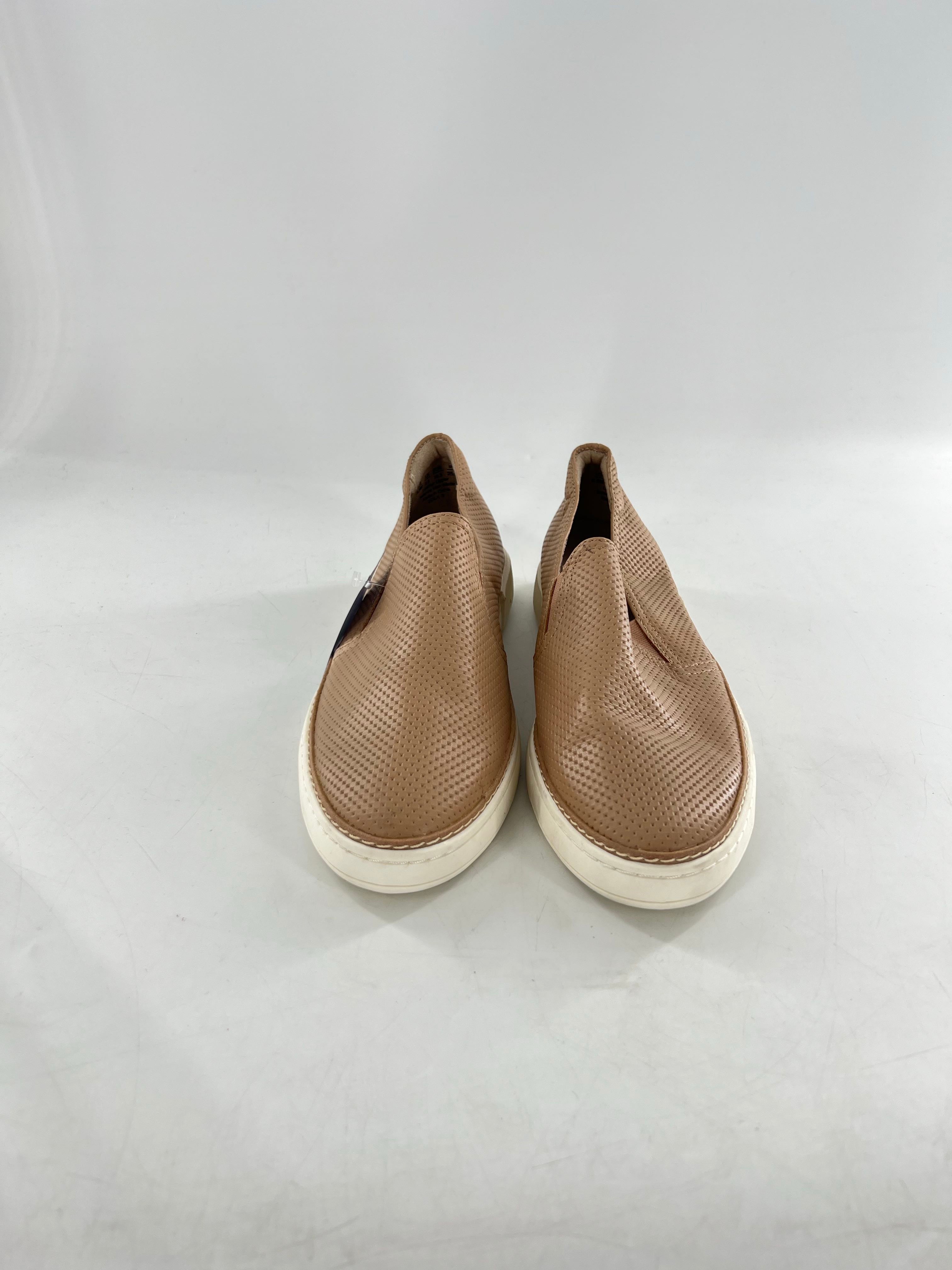 8.5 perforated leather slip-ons