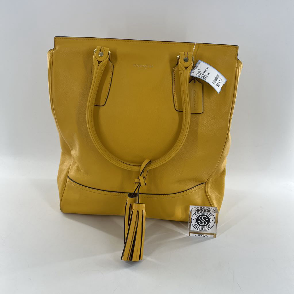 top zip tassel tote