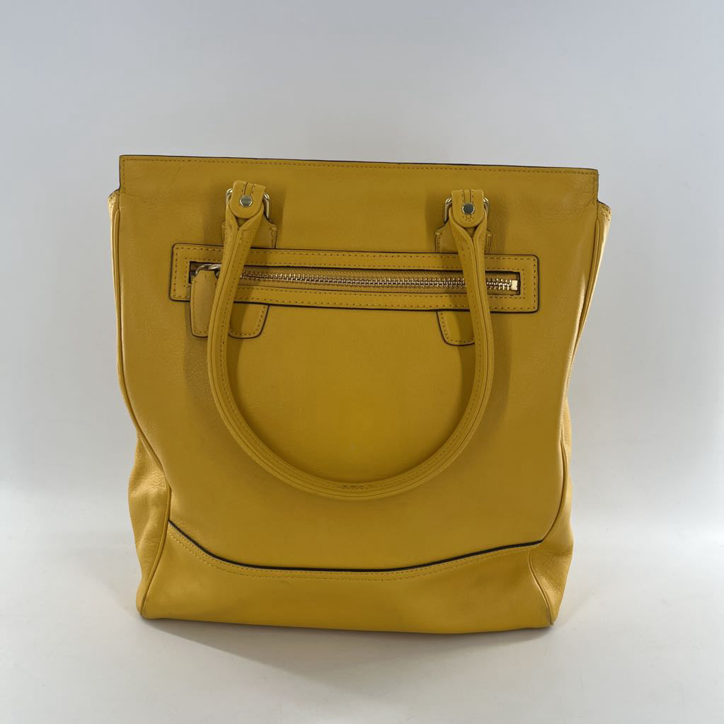 top zip tassel tote