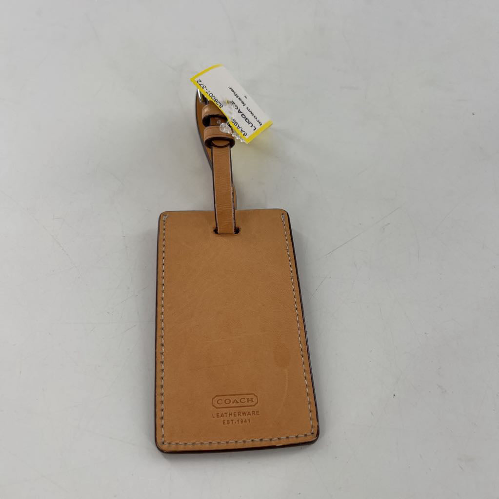 brown leather coach luggage tag