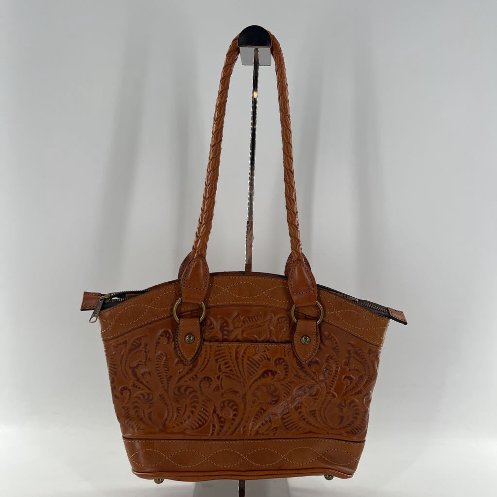 hand tooled footed shoulder bag