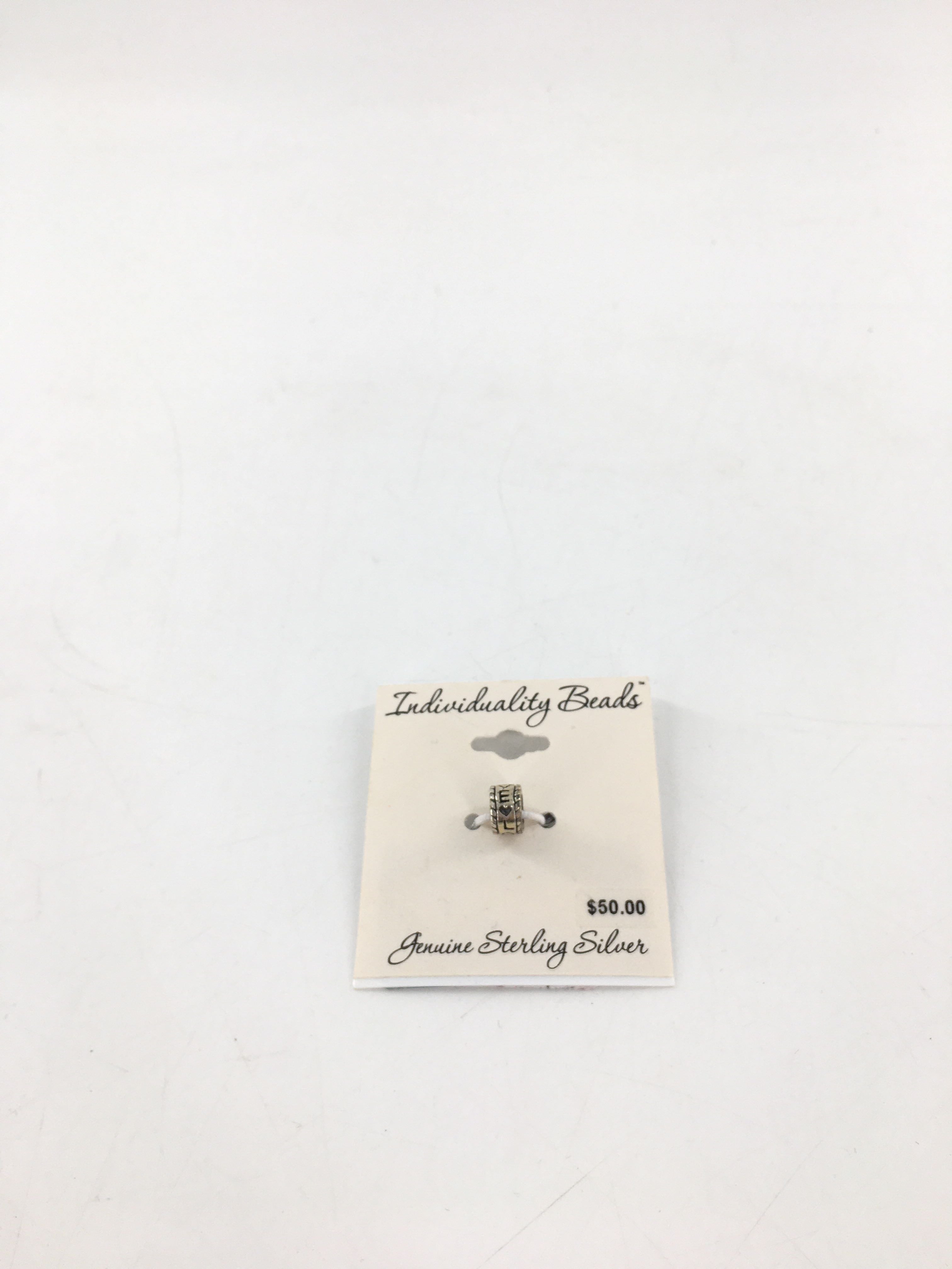 R50 sterling silver charm