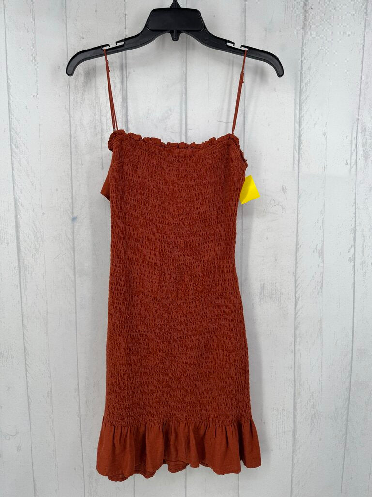 XS smocked back tie ruffle hem mini dress