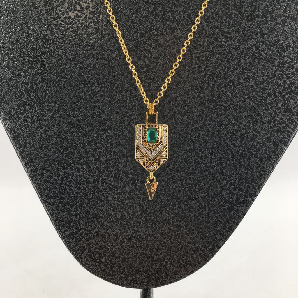 10" gold tone necklace w/ emerald green stone pendant