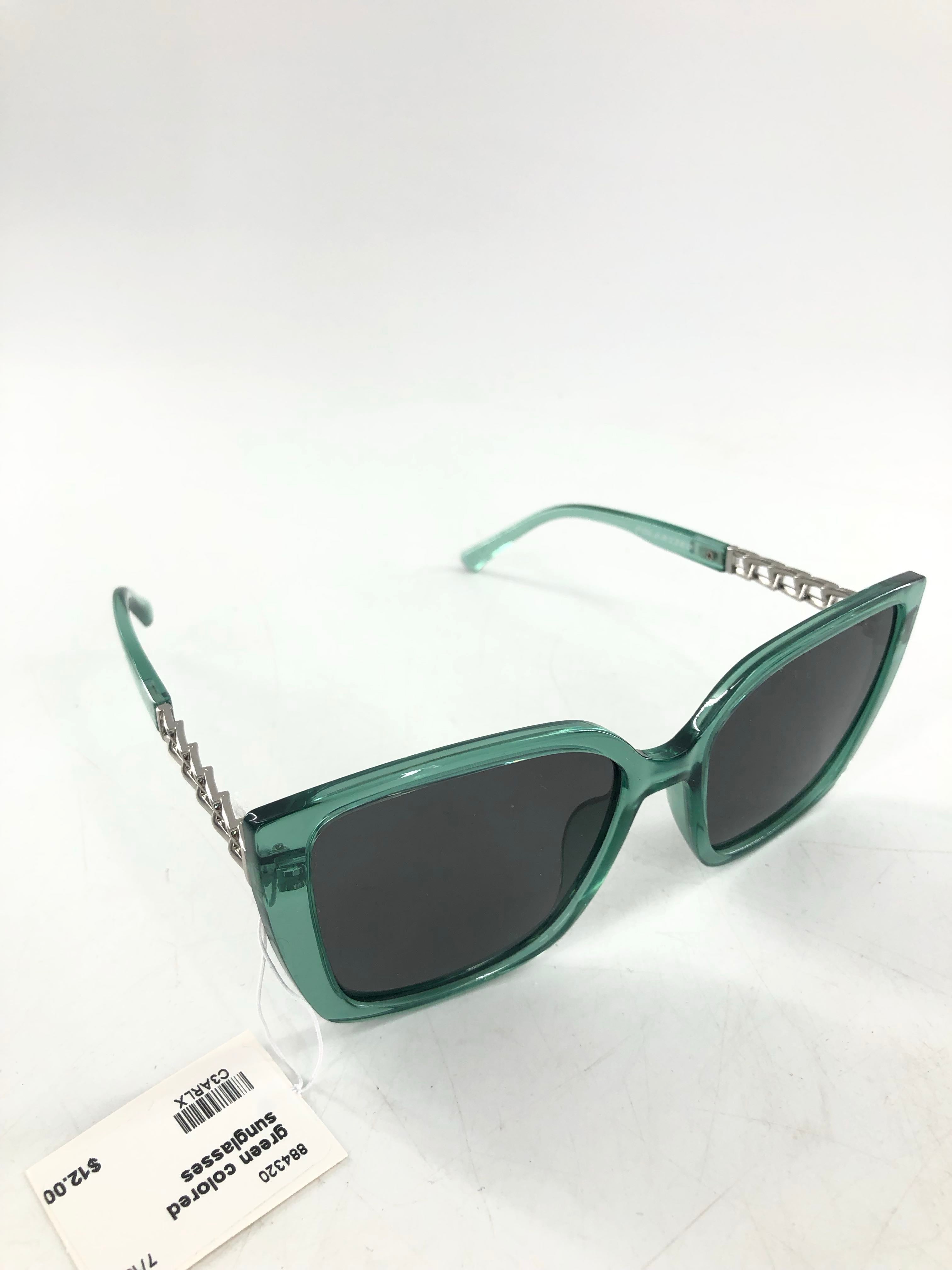 green colored sunglasses
