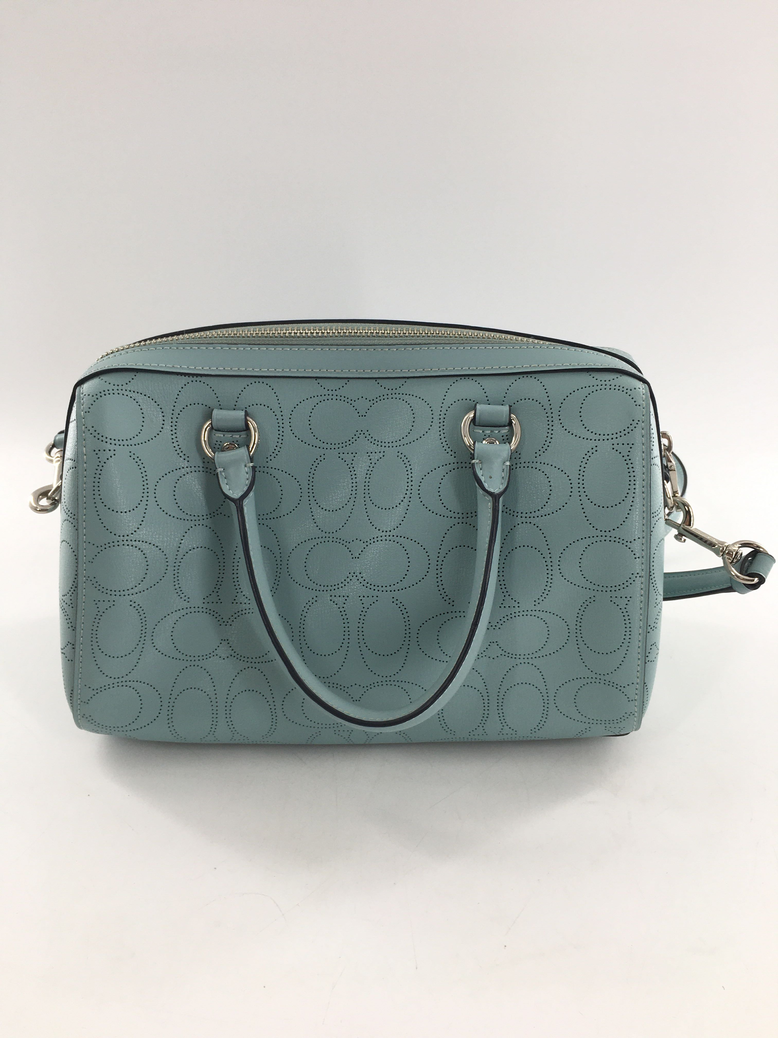 perforated signature pattern satchel