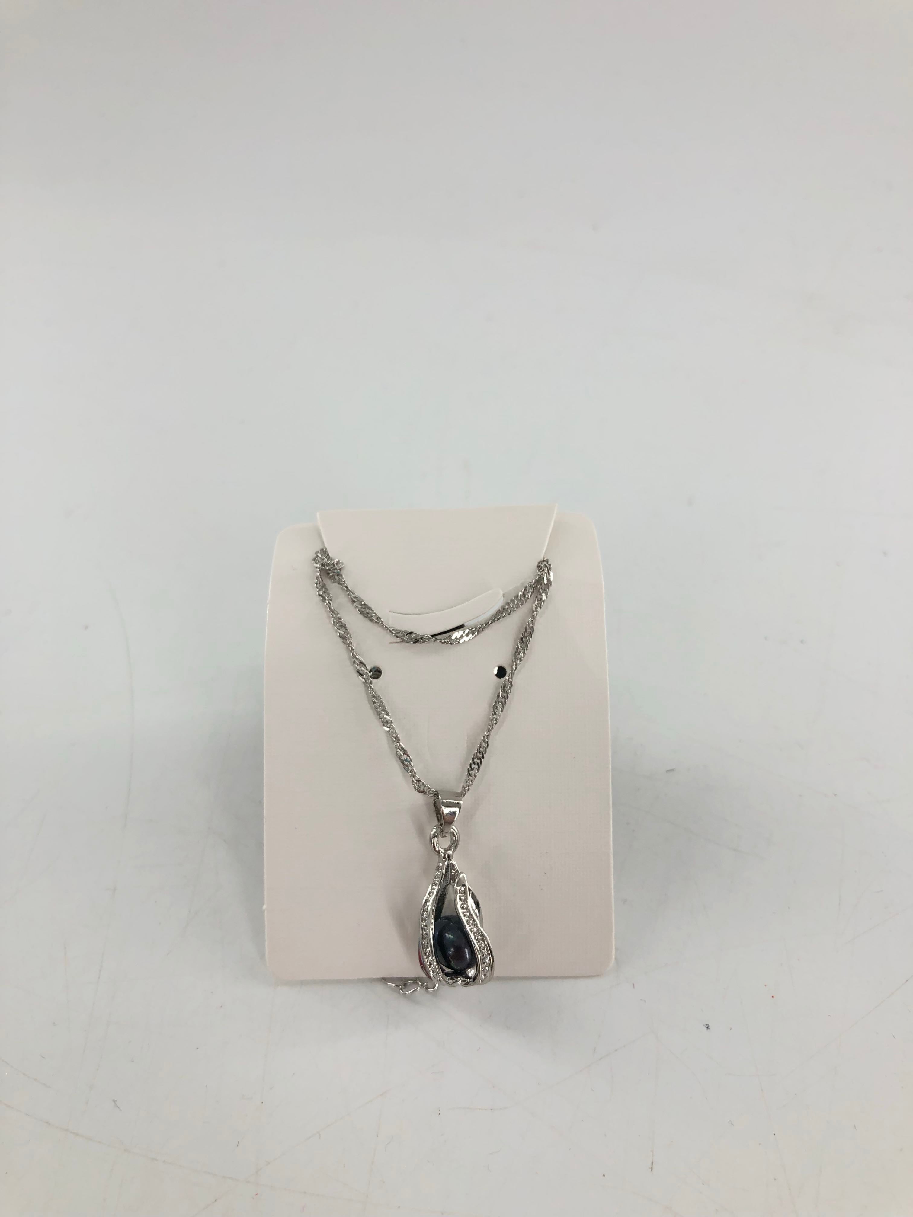 silver necklace w/ black pearl