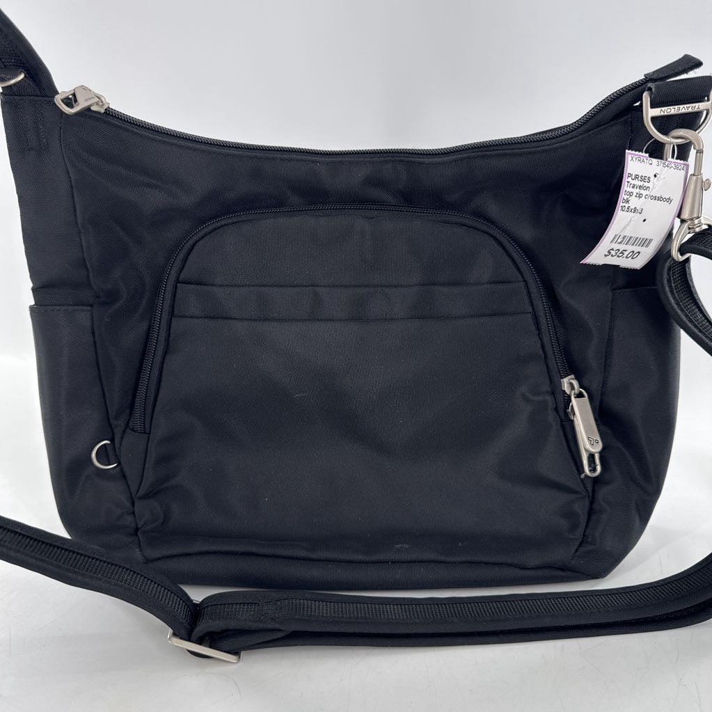 top zip crossbody w/ front outside zip around pocket