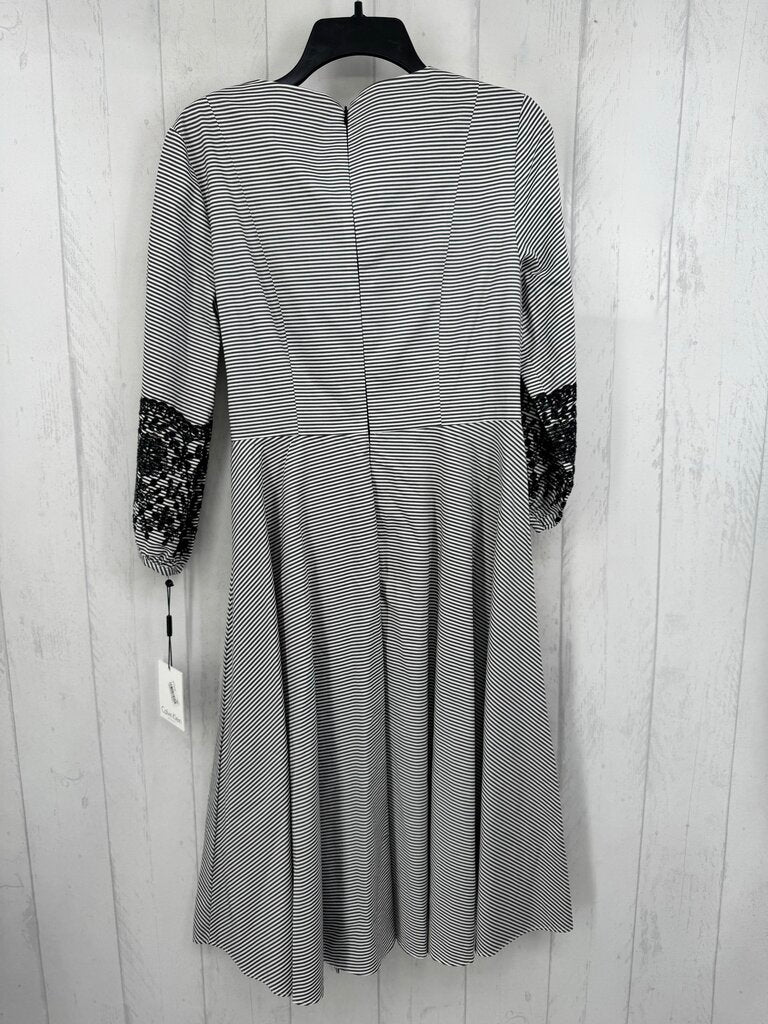 8 eyelet lace slv pin stripe cross-over dress