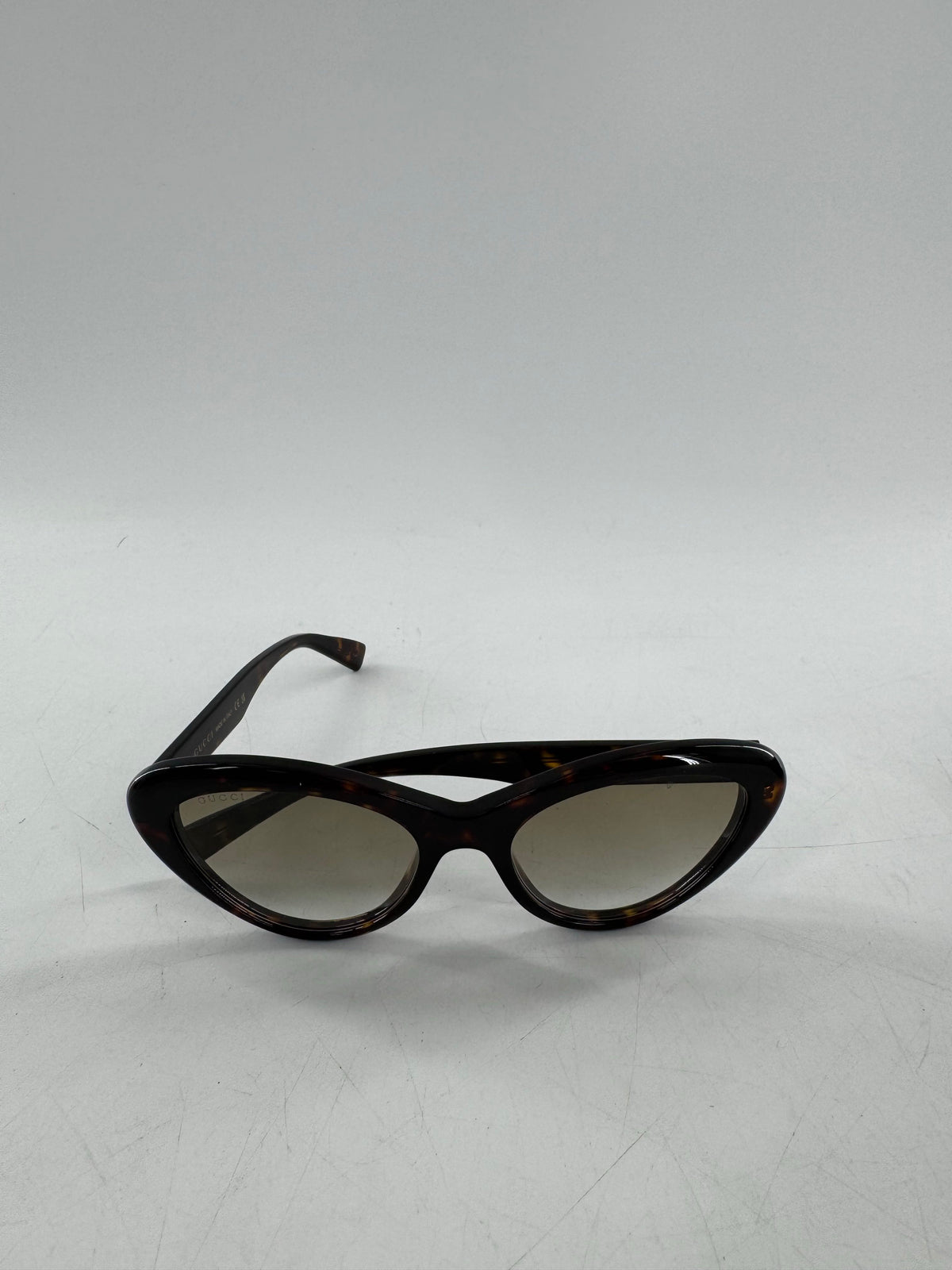 Gucci tortoiseshell cat-eye sunglasses w/ case
