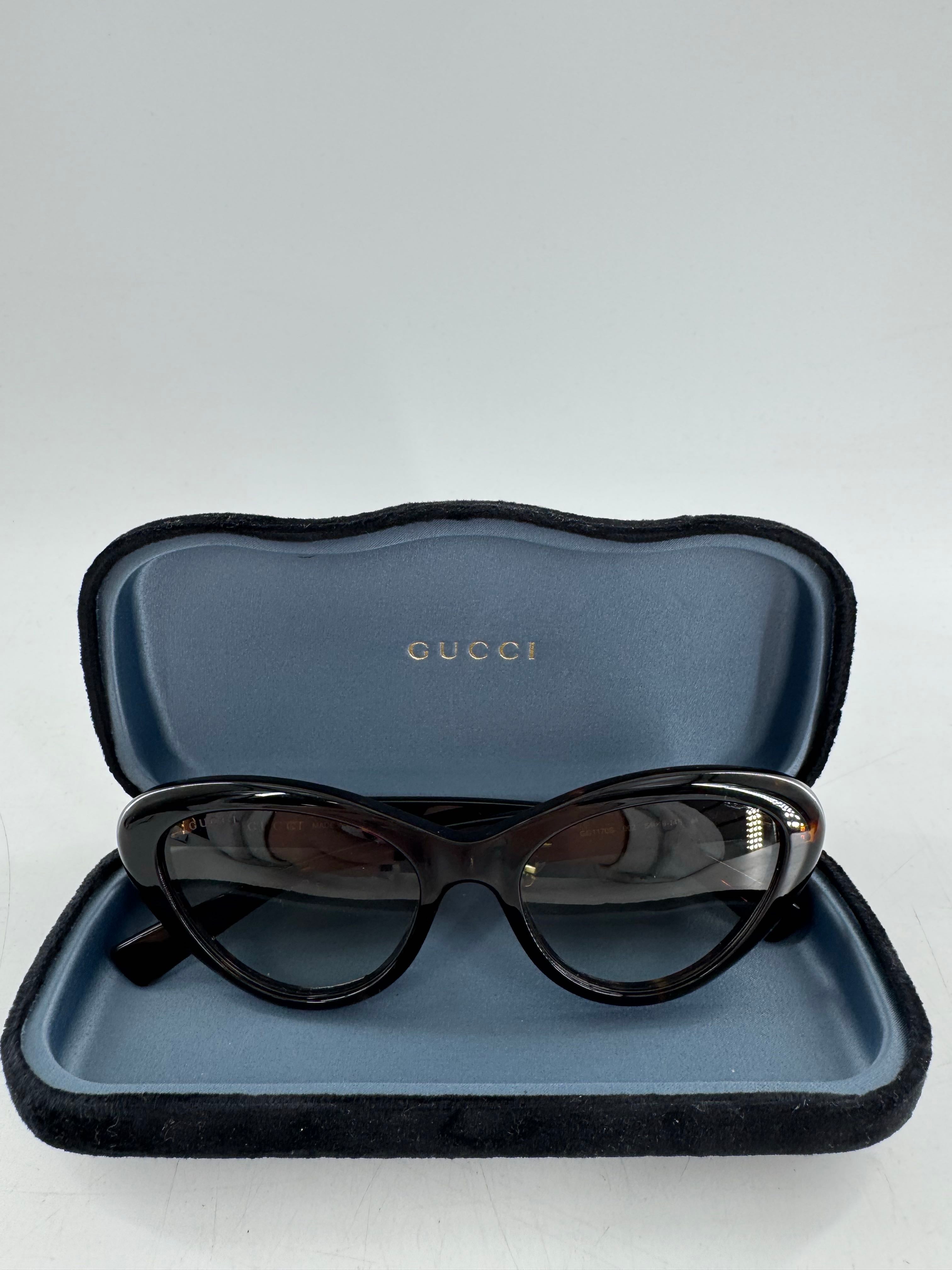 Gucci tortoiseshell cat-eye sunglasses w/ case