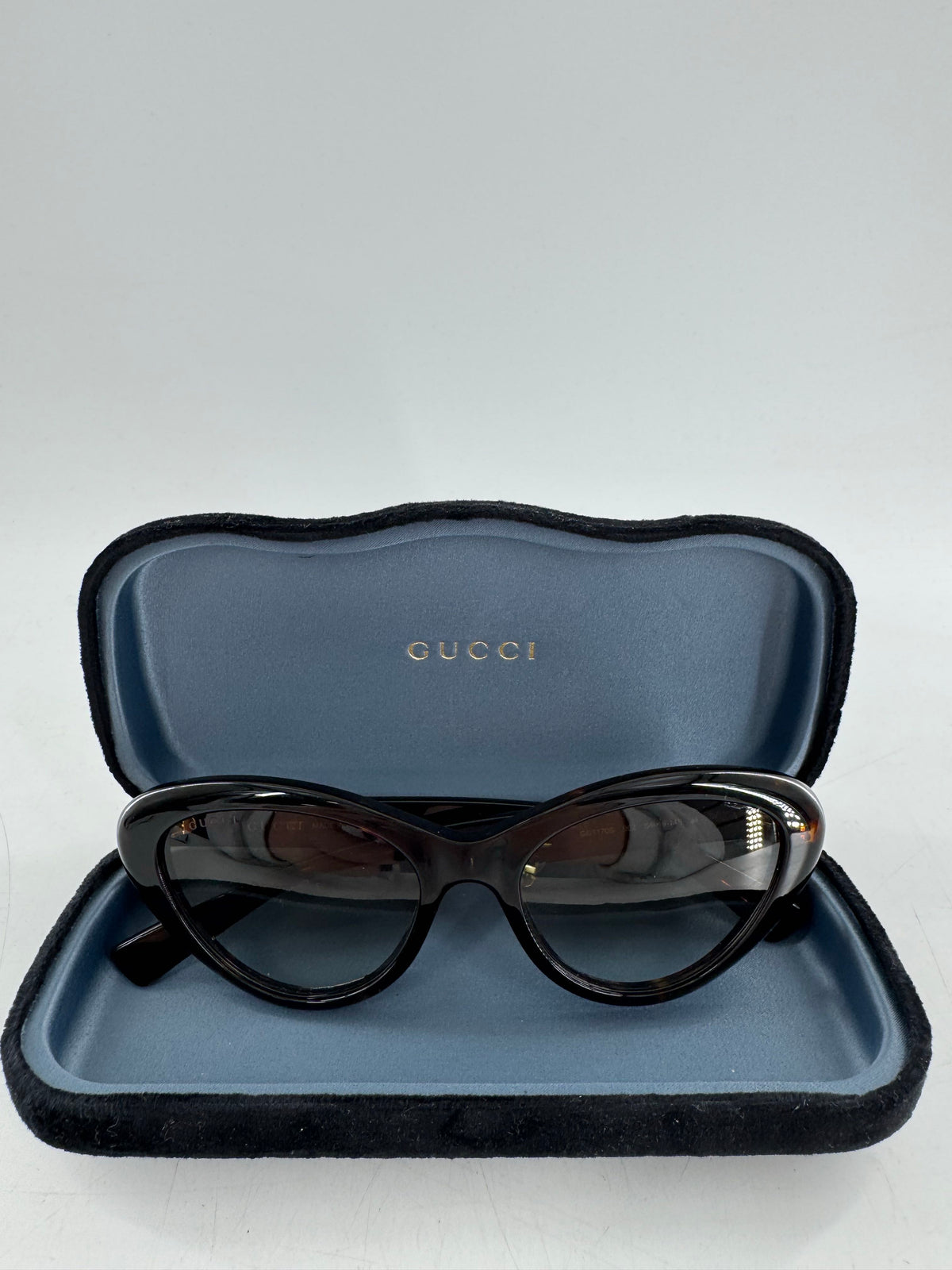 Gucci tortoiseshell cat-eye sunglasses w/ case