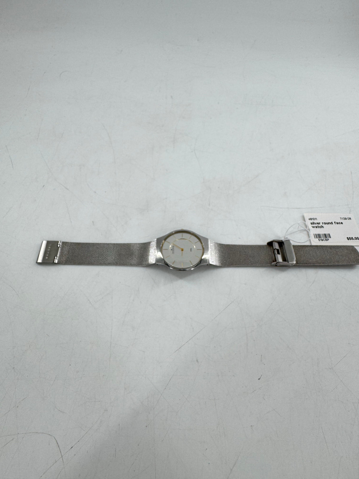 silver round face watch