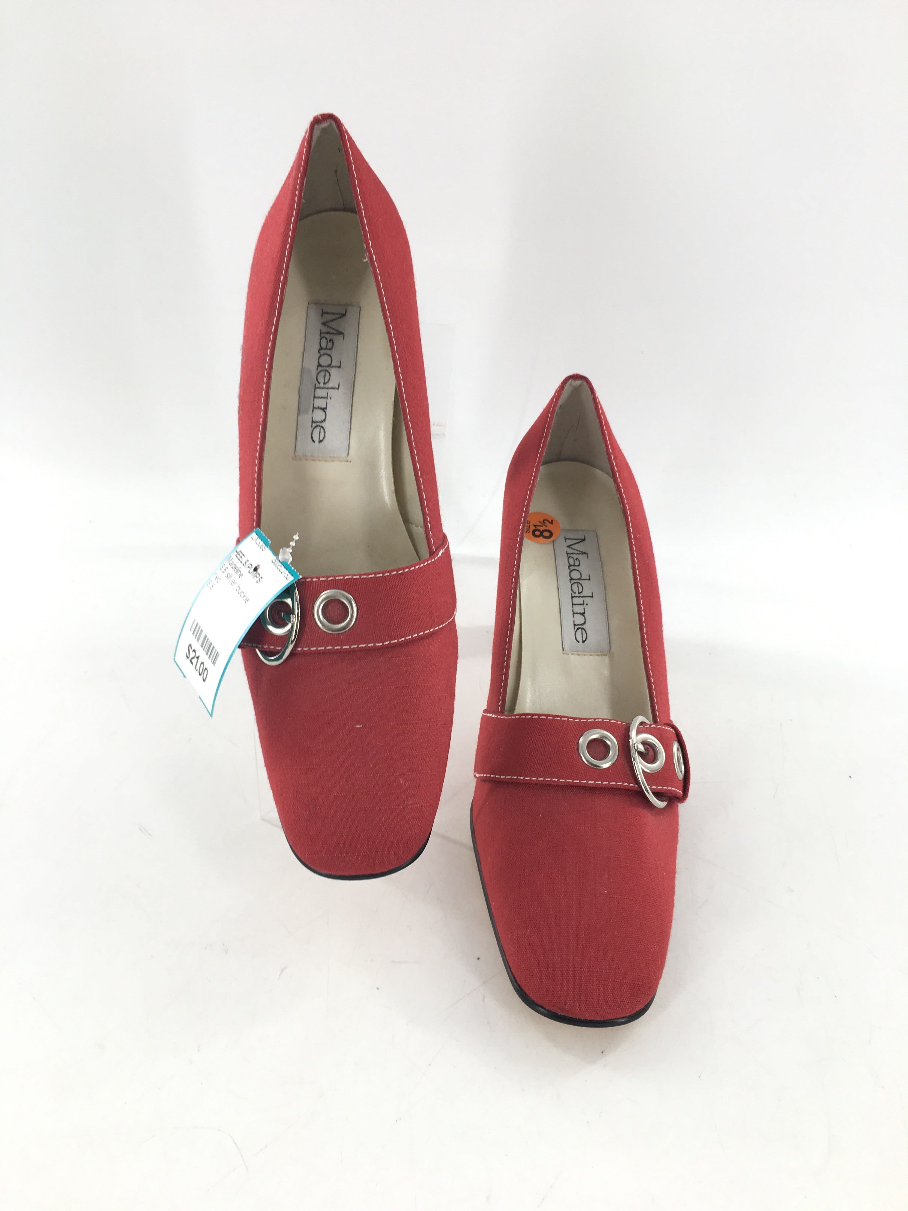 8.5 silver buckle pumps