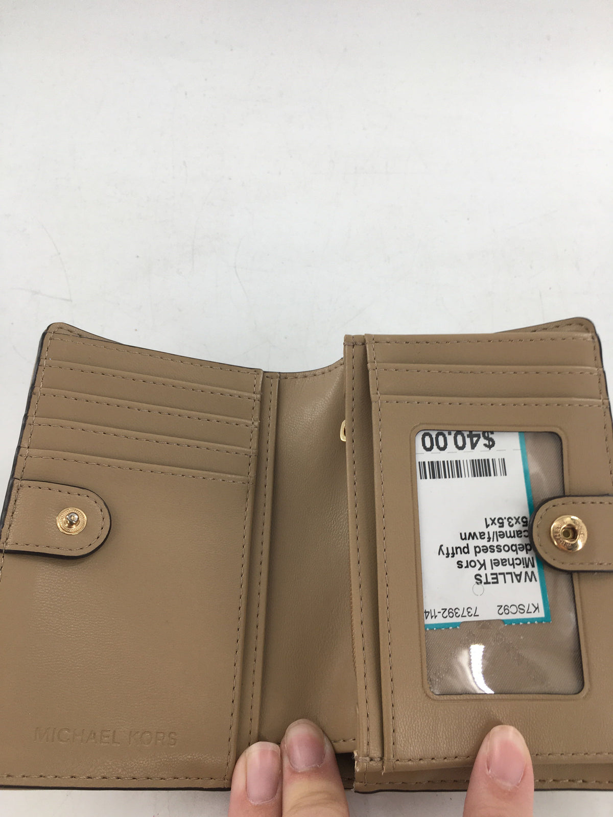 debossed puffy monogram bifold wallet