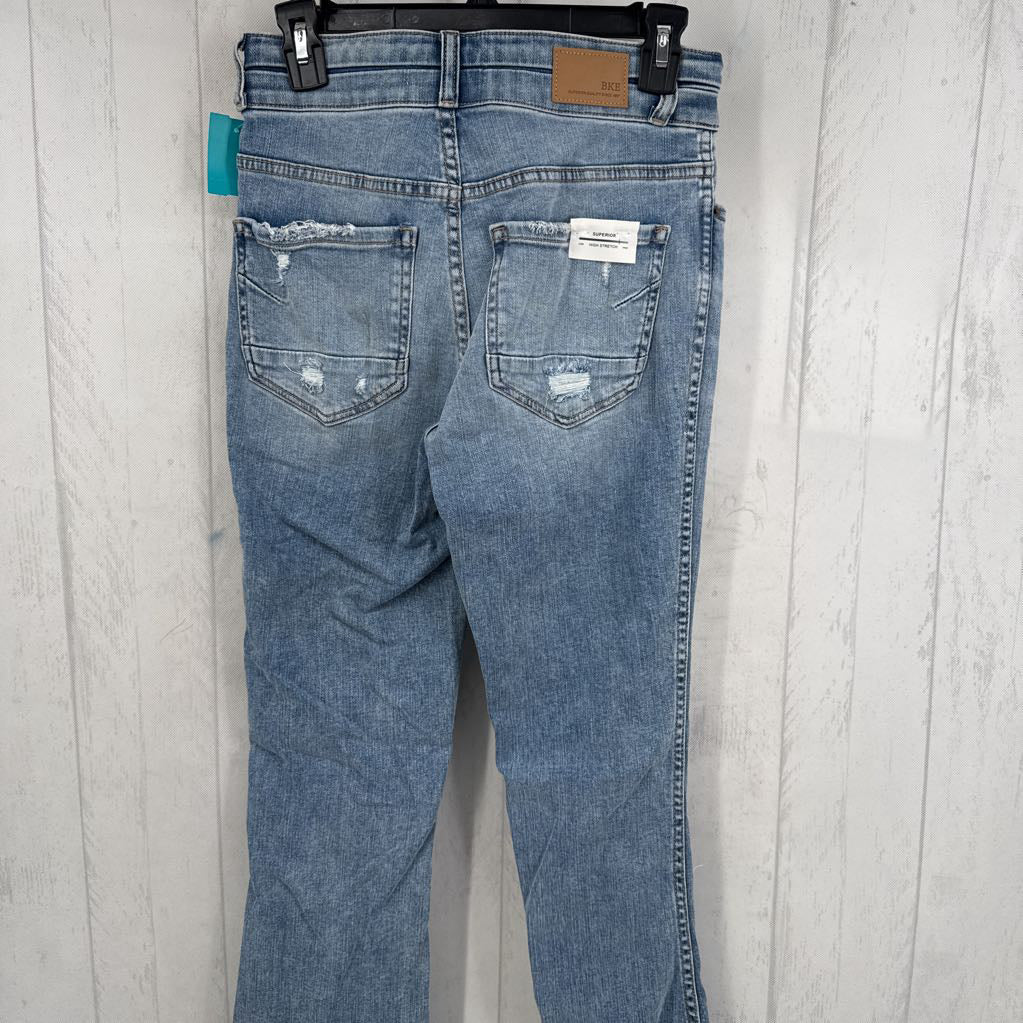 25 distressed super flare jeans