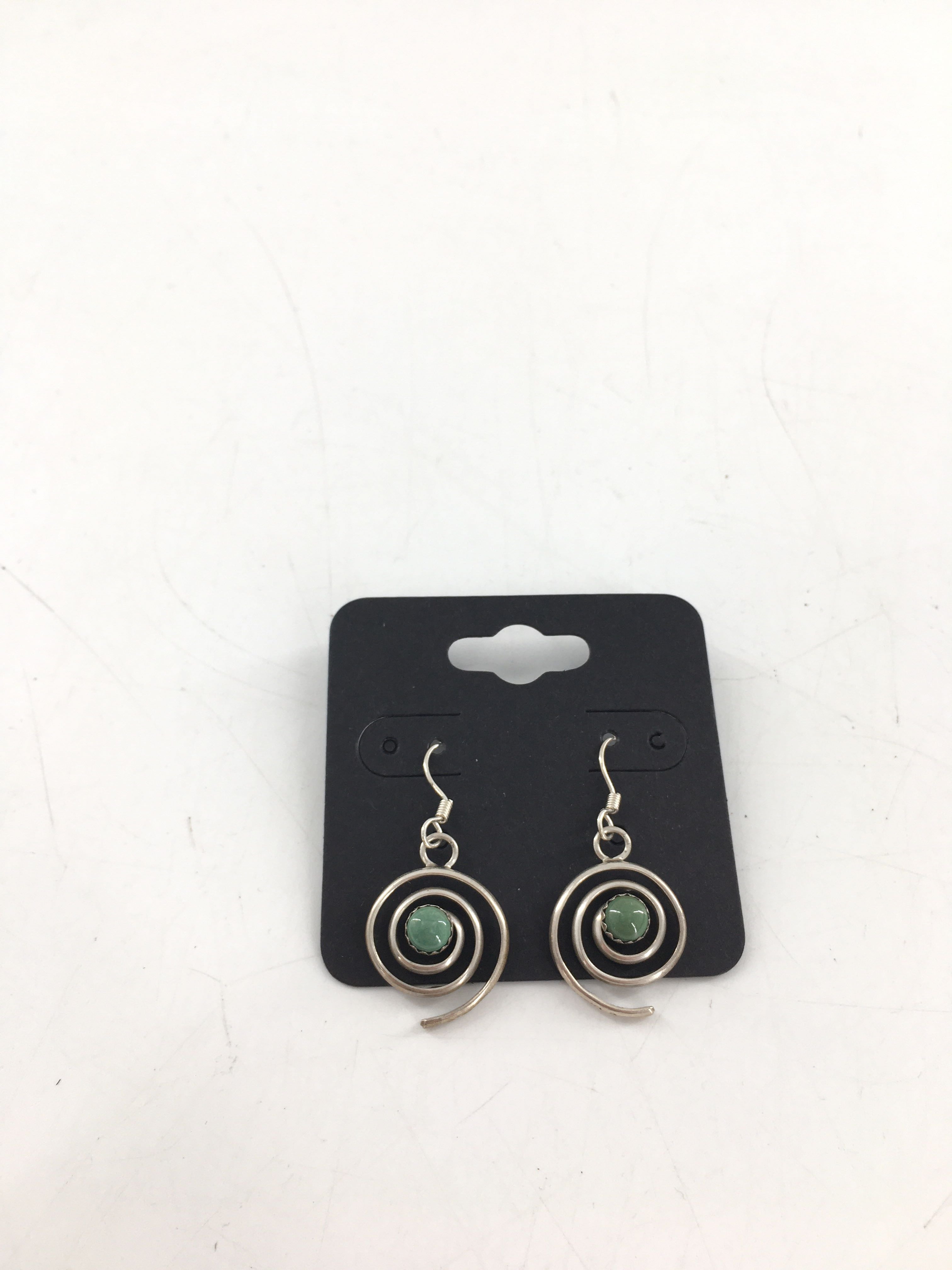 silver earrings w/green stone