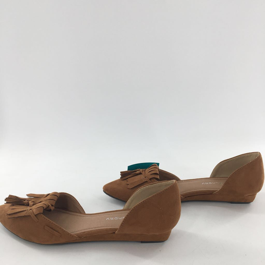 9 faux suede fringe & tassel slip-ons